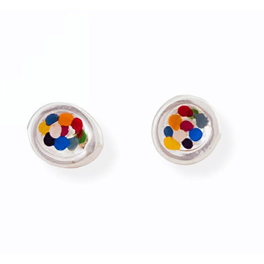 These Colour Dot Earrings Sterling Silver Rainbow by FR | Art Jewellery feature a stunning pair of round, silver earrings adorned with colorful, confetti-like dots. The hand-painted design against a plain white background offers a vibrant and simple look that truly stands out.