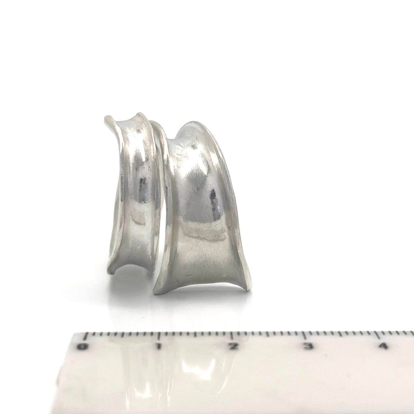 Concave sterling silver statement ring with a sculptural, flowing design inspired by ocean movement – handcrafted in Australia by FR Art Jewellery. measure look