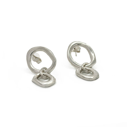 Sterling silver handcrafted sculptural earrings with circular studs and abstract linked drops by FR Art Jewellery.