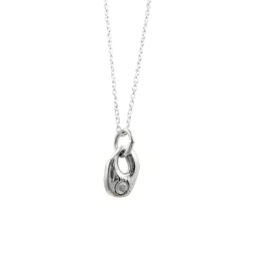 The Eye Sterling Silver Necklace by FR | Art Jewellery features a handmade sterling silver chain with a topaz accent, offering subtle elegance to any look.