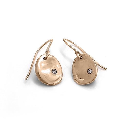 Explore the Full Moon Sterling Silver and Gold Earrings from FR | Art Jewellery's Lunar Collection. This handcrafted jewelry features gold oval shapes adorned with a central round diamond. The elegant hook design ensures effortless wear, beautifully highlighted against a plain white background.