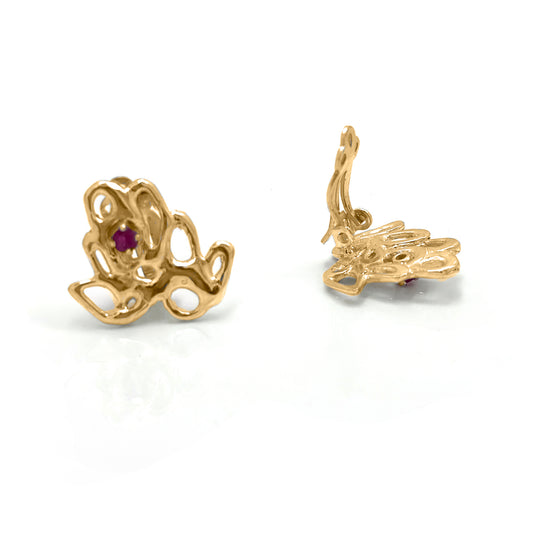 Gold-plated sterling silver maple-shaped clip-on earrings with a ruby gemstone in the center.