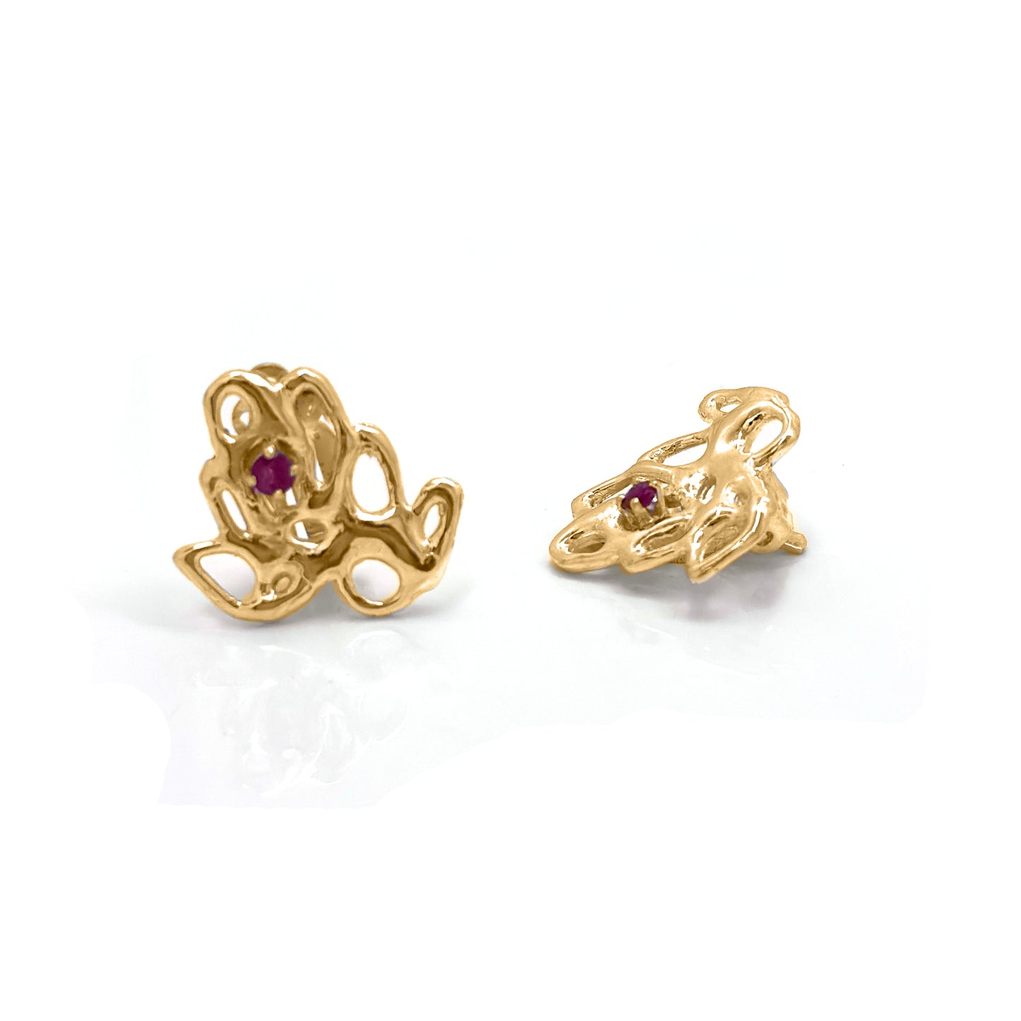 Gold-plated sterling silver maple-shaped clip-on earrings with a ruby gemstone in the center FR Art Jewellery