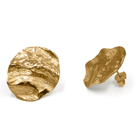 Ocean Whisper Sterling Silver Earrings by FR | Art Jewellery feature two rough, metallic silver discs with textured surfaces, capturing raw coastal beauty. From the Handmade Shell & Coastal Jewellery collection. Shown on a white background.