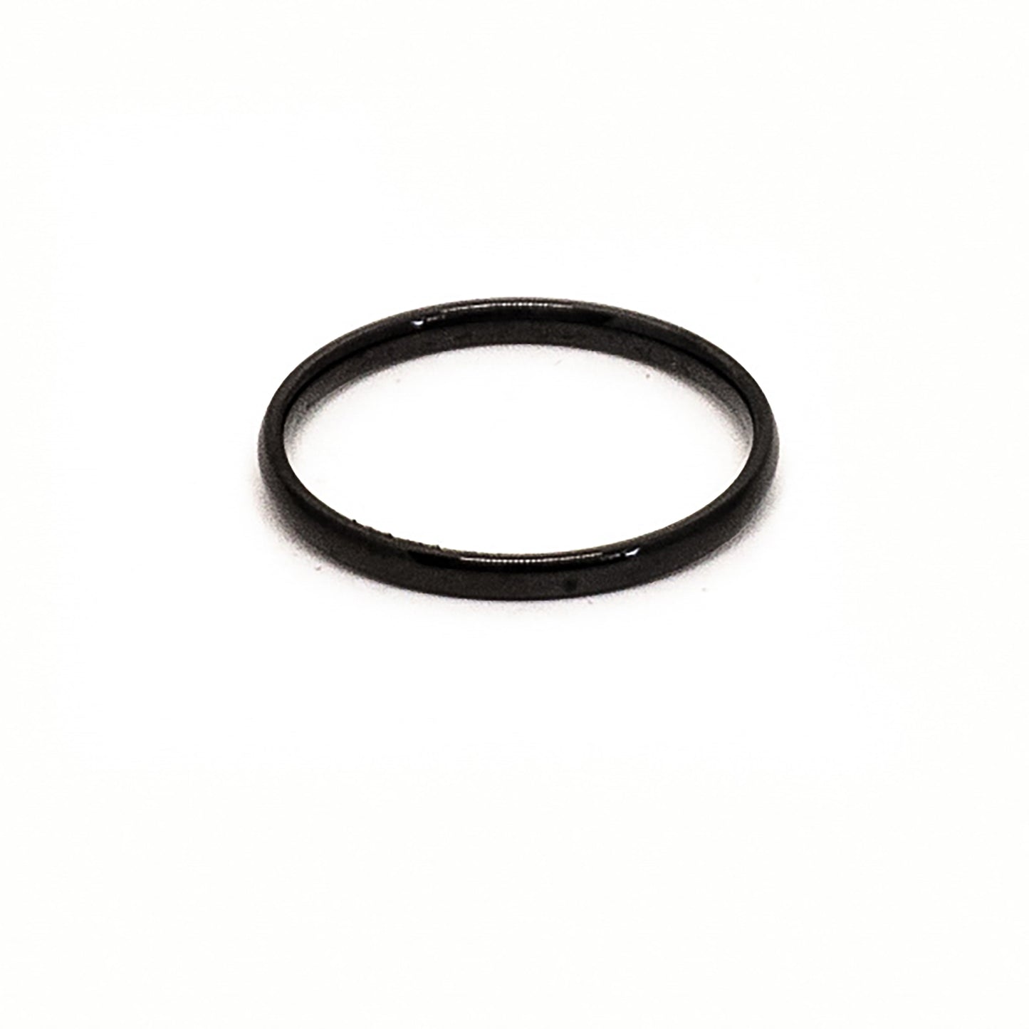 The Stainless Steel Black 2mm ring by FR | Art Jewellery is displayed upright against a plain white background, showcasing its simple and thin stacking design.