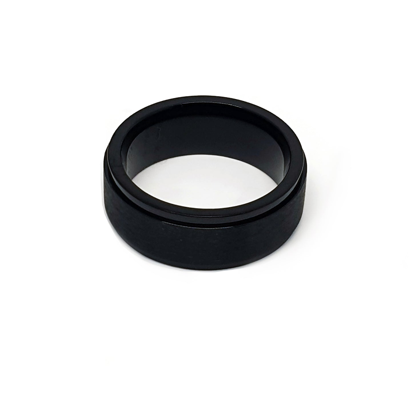 The FR | Art Jewellery Stainless Steel Rotatable Black ring features a sleek matte finish and minimalist design, offering a smooth comfort fit for daily wear. Displayed against a white background, it's modern and stylish.