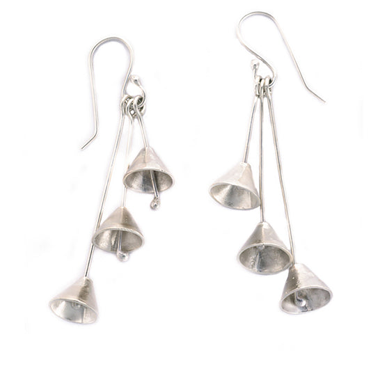 Check out the "Three Cones" earrings from FR | Art Jewellery, featuring three dangling cone-shaped pendants on each gold-plated piece, attached to hooks. These handmade jewellery items boast a metallic shine that reflects light beautifully, offering a stunning appearance.