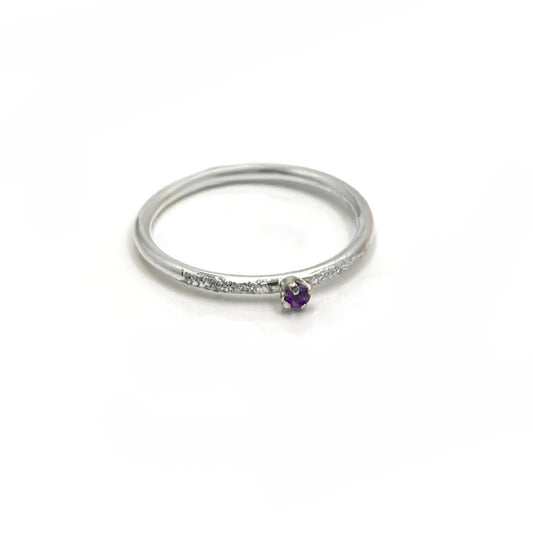 The Tinytoo Sterling Silver twisted Ring with Amethyst Gemstone by FR | Art Jewellery features a minimalist design—perfect for everyday elegance and beautifully displayed on a white background.