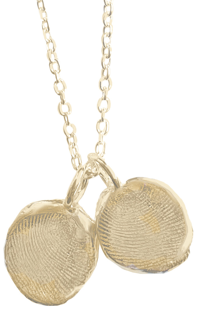 A gold necklace featuring two fingerprint pendants, each hanging from a delicate chain. The intricate fingerprints add a personal and unique touch to the elegant jewelry piece.