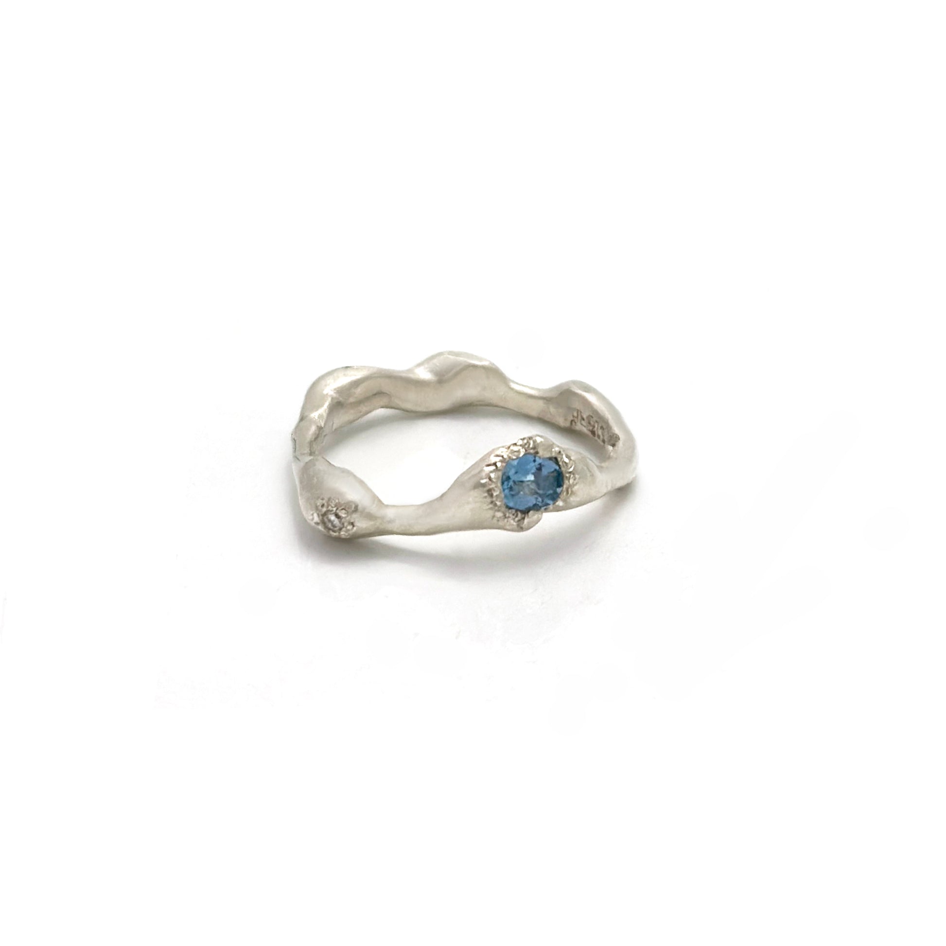 Handmade sterling silver ring with aquamarine and diamond by FR | Art Jewellery, Sydney – organic sculptural design inspired by ocean waves. angle photo