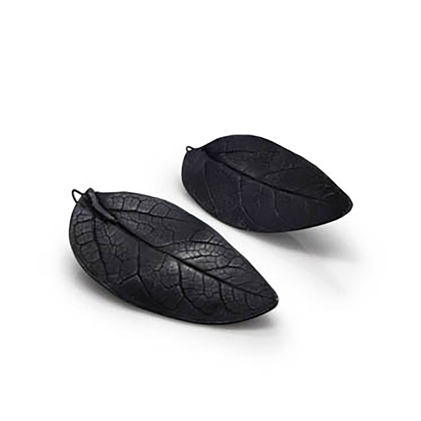 Introducing the Black Leaf Earrings by FR | Art Jewellery: a stunning pair of dark, leaf-shaped earrings featuring intricate vein patterns that mimic real leaves. Each handcrafted piece is designed for secure fastening with a hook, showcasing a unique design where the left earring has a gently curved shape and the right one remains more flat and straight.