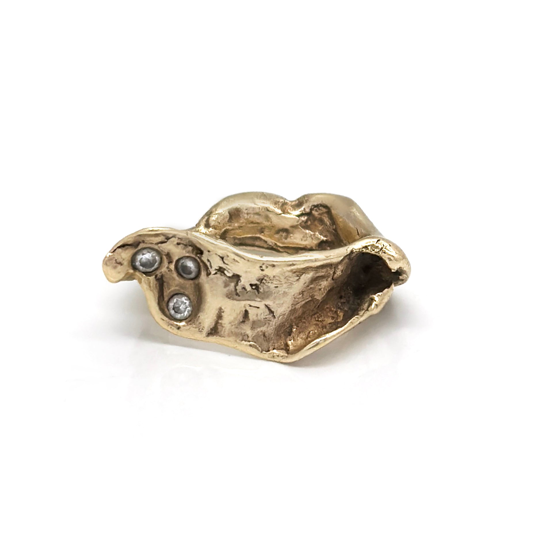 Introducing the Caracoles Custom Ring by FR | Art Jewellery, a gold-plated piece with a distinctive coiled snake design. The detailed head of the snake features a small, round gemstone as its eye, and the ring's overall rough and organic texture enhances its unique appearance. Part of our handmade jewellery collection, it stands out beautifully against a plain white background.