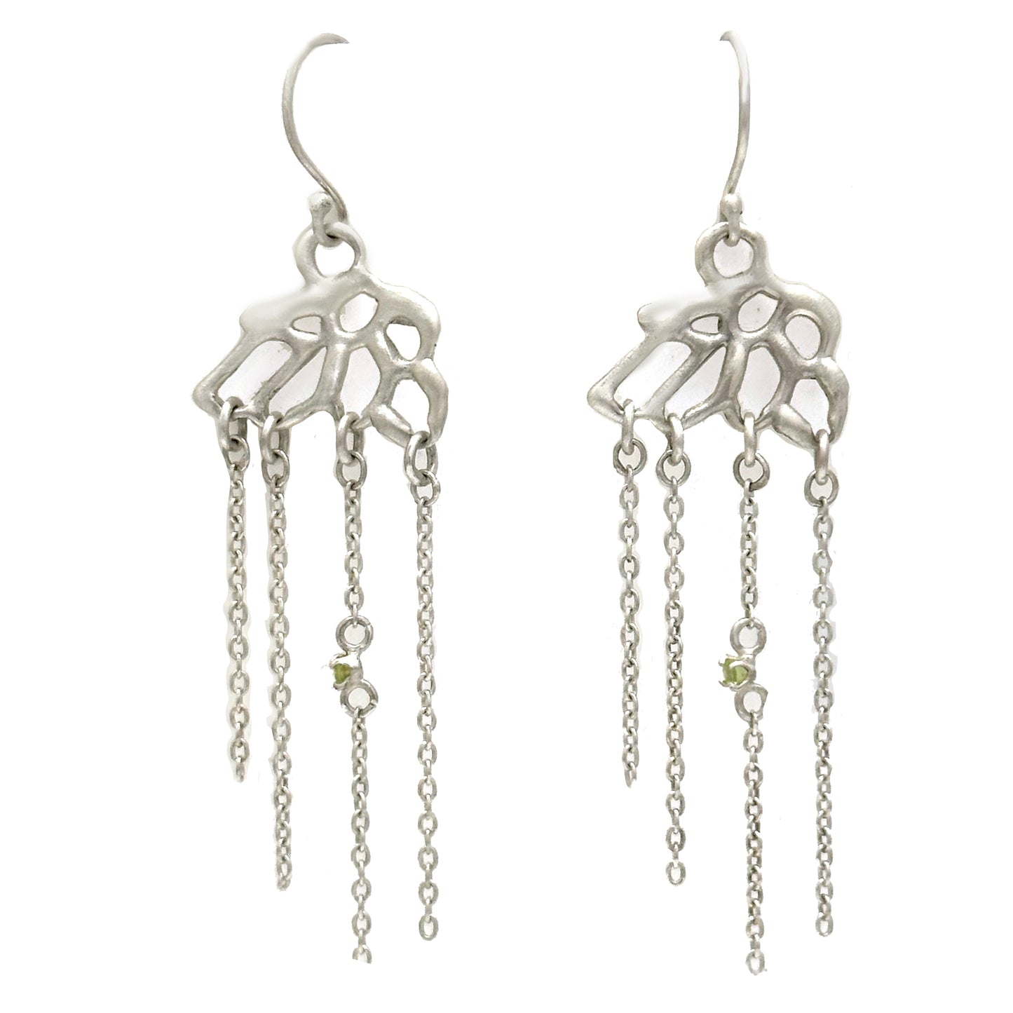 These Cloud Earrings from the Blossom series by FR | Art Jewellery are crafted in sterling silver and showcase an abstract, organic design at the top. Each earring features three delicate chains, each adorned with a small green gemstone. The easy-to-wear hook-style clasps complete these elegant pieces.