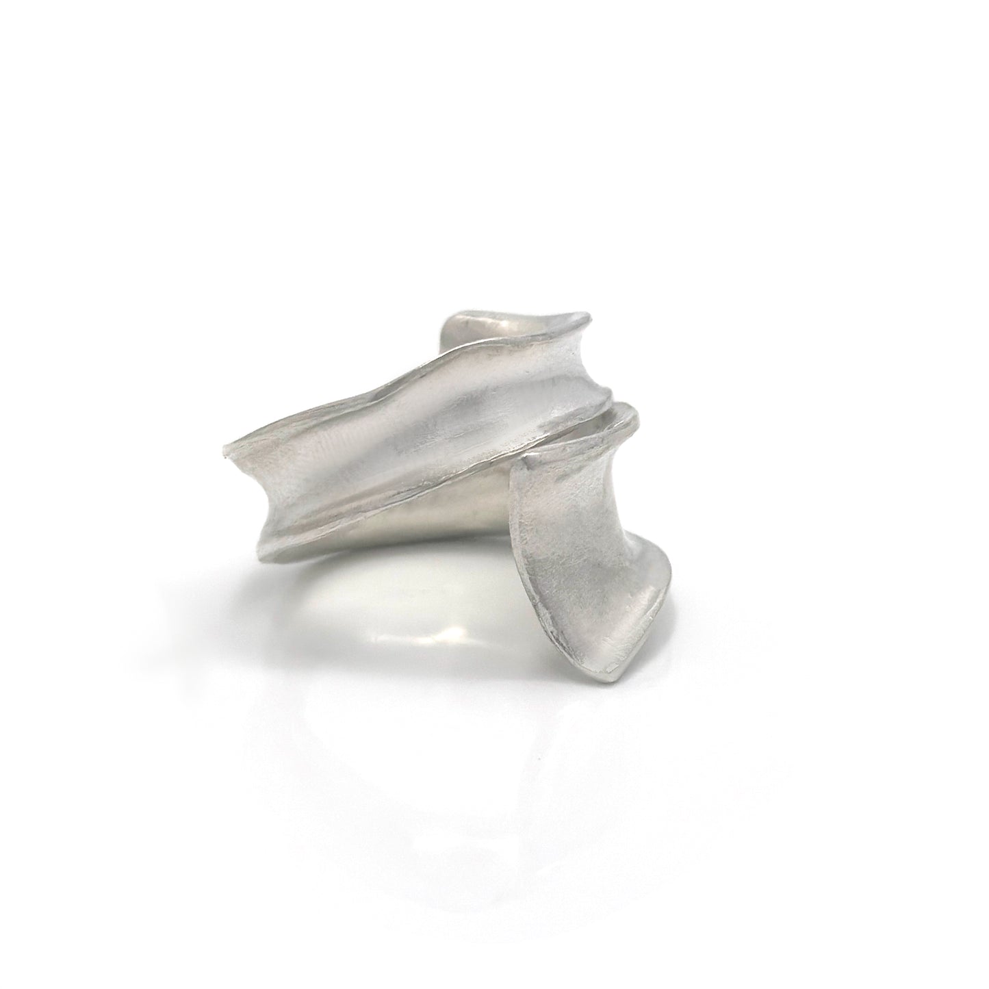 Concave sterling silver statement ring with a sculptural, flowing design inspired by ocean movement – handcrafted in Australia by FR Art Jewellery. side look