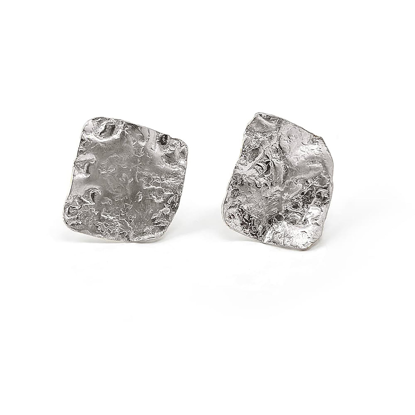 The Coral Way Earrings by FR | Art Jewellery are a pair of gold-plated, textured stud earrings that boast an uneven, organic, and rustic appearance. Each earring features a slightly crumpled, hammered finish on the surface, giving them a unique handcrafted look. Set against a plain white background, these earrings are perfect for those who appreciate handcrafted jewellery.