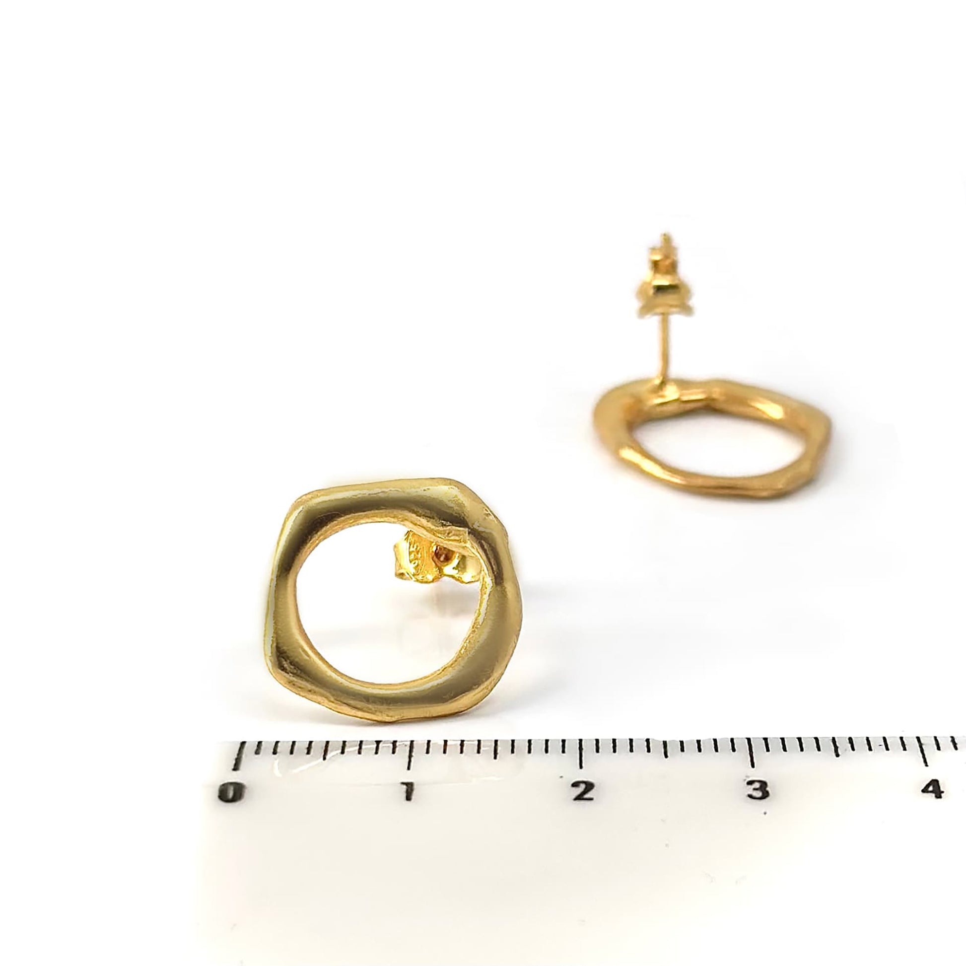 A pair of Crown Earrings by FR | Art Jewellery, featuring a unique, irregular circular design in custom-made gold. These handmade pieces showcase a polished finish and are highlighted against a plain white background.