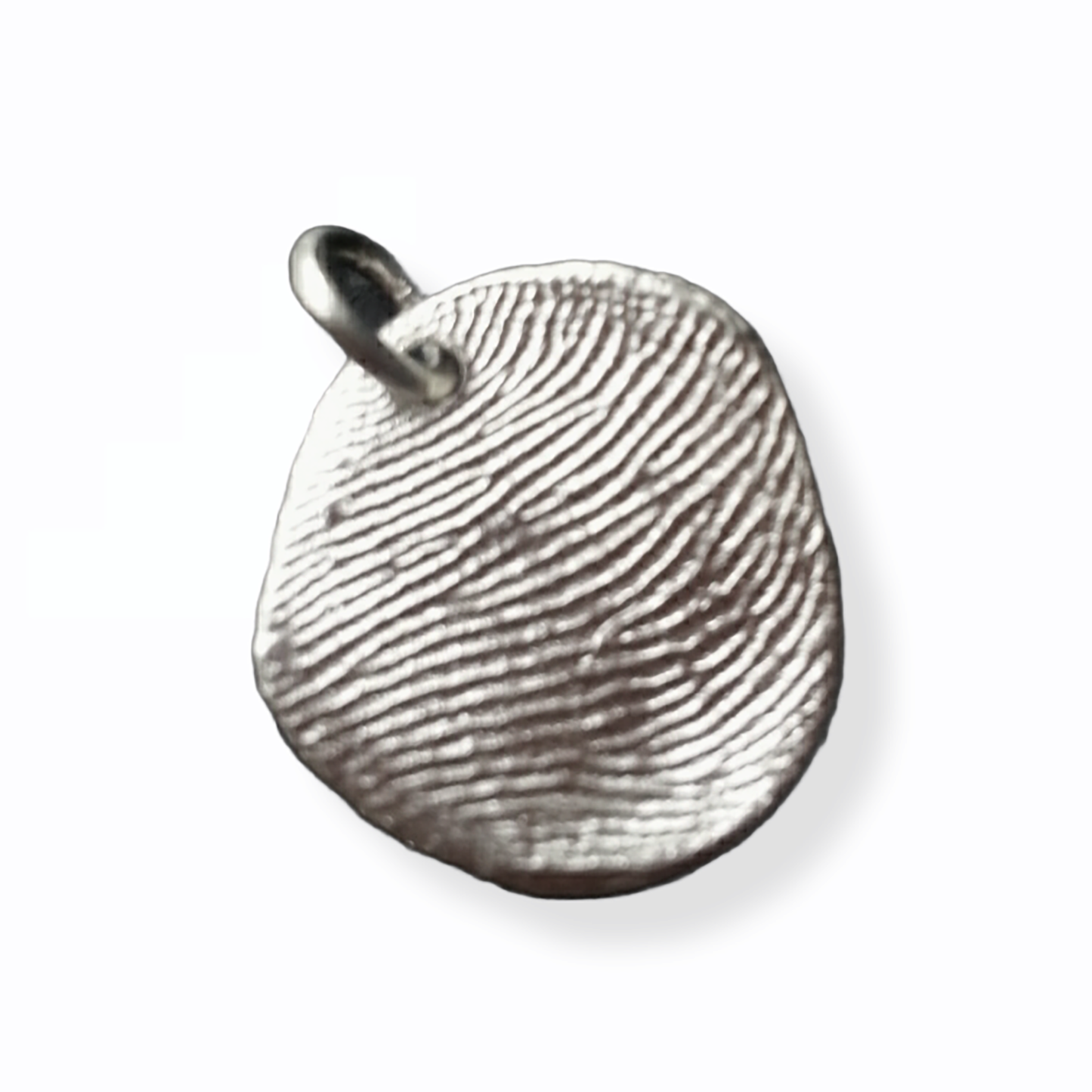 Introducing the Fingerprint Necklace by FR | Art Jewellery—a gold chain link design adorned with two round pendants, each uniquely imprinted with custom fingerprint designs. The pendants hang closely together, creating Custom Impressions for a personalized and elegant accessory. Displayed on a plain white background, this necklace beautifully emphasizes the intricate details of the fingerprint textures.