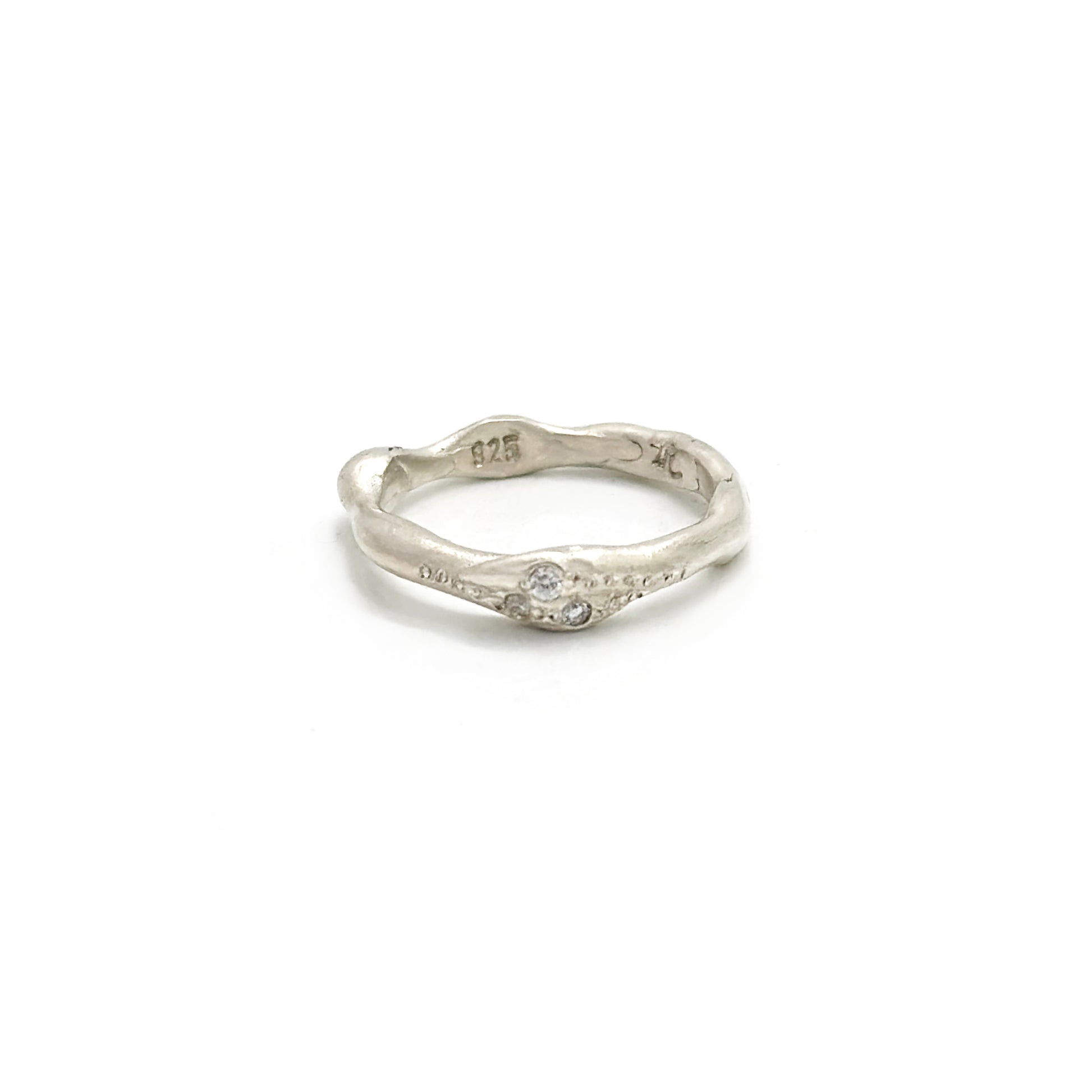 Handmade sterling silver ring with three white diamonds by FR | Art Jewellery, Sydney – organic sculptural band with natural curves and polished finish.