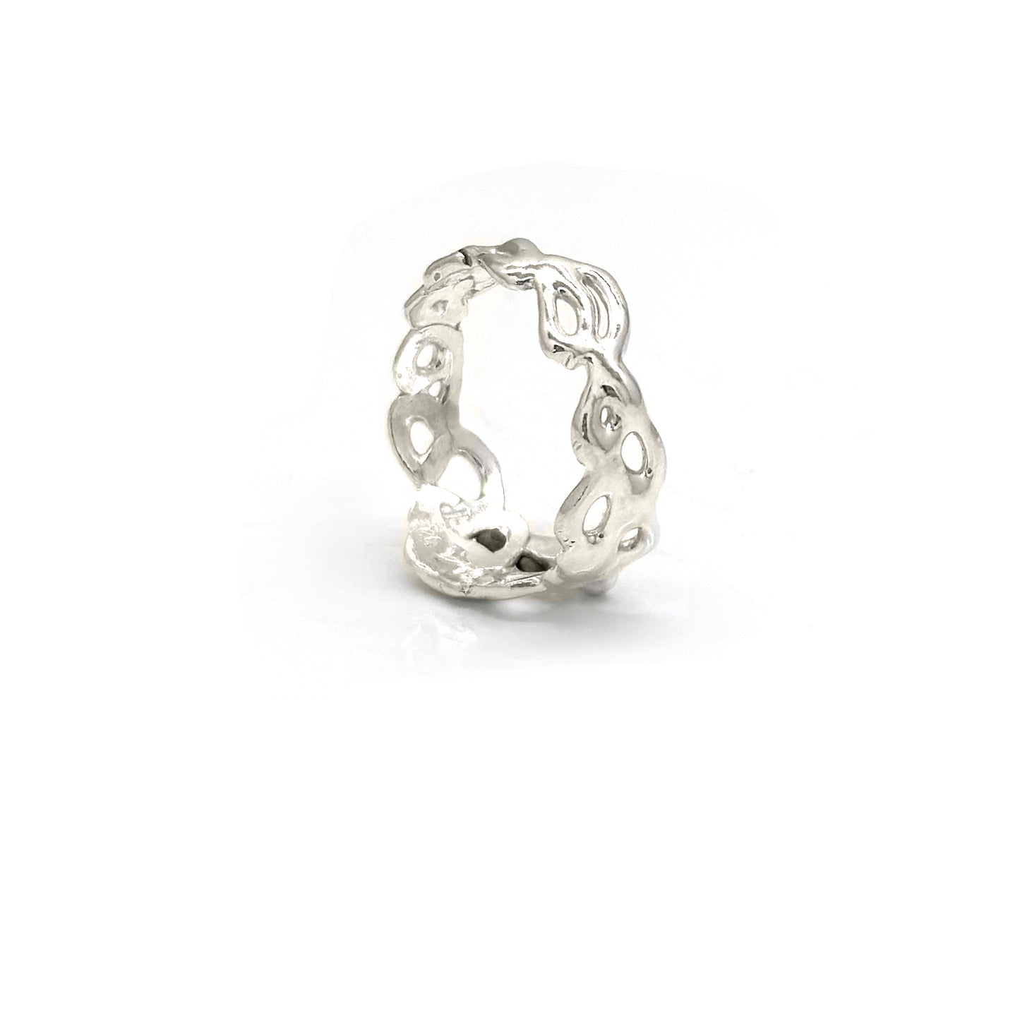 Introducing the Glimpse V3 Ring by FR | Art Jewellery, a delicate silver piece that showcases an intricate cut-out design with entwining patterns and small flowers. This handmade ring features a polished finish, enhancing its elegant appearance.