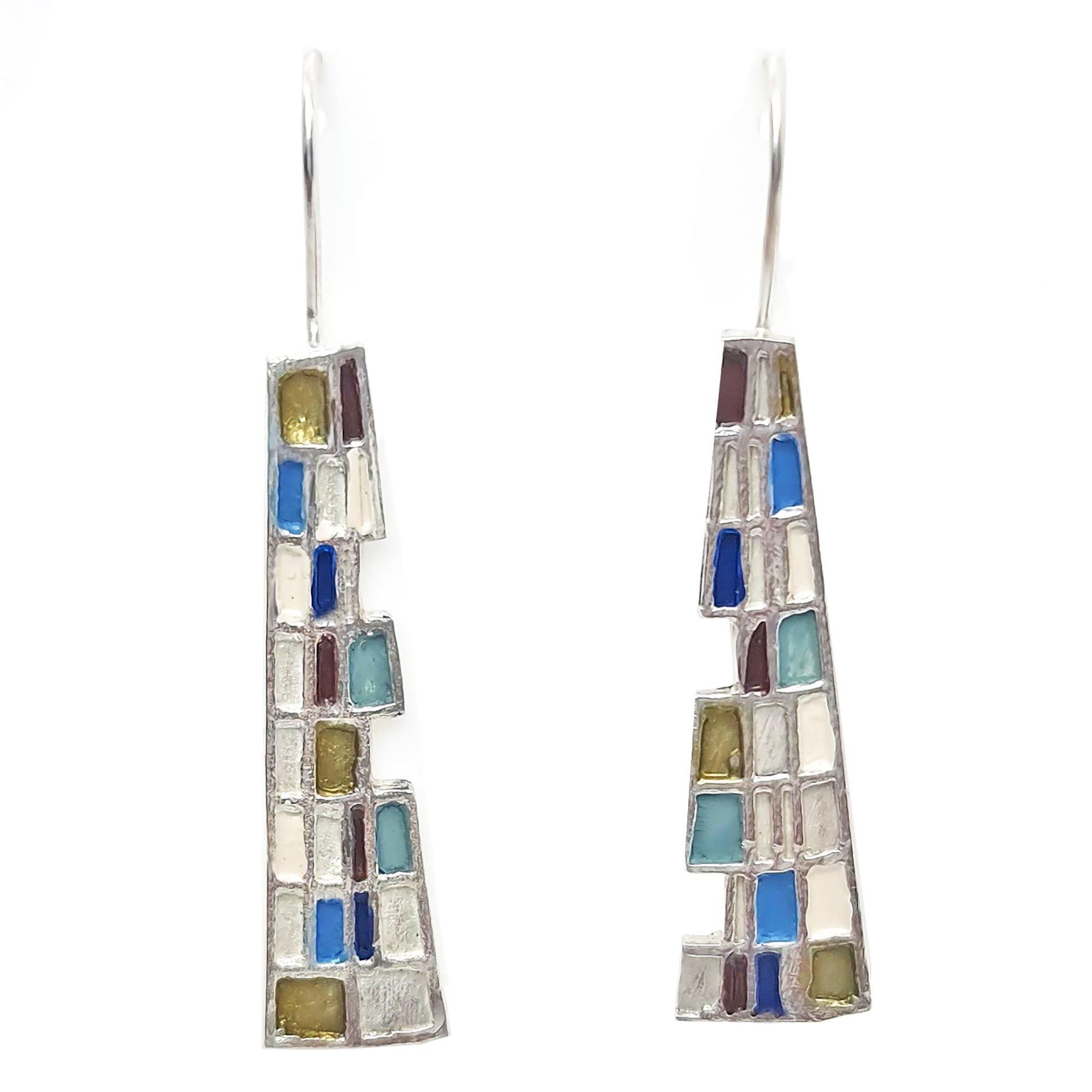 Introducing the Gustav Small Earrings by FR | Art Jewellery: A pair of handmade, dangling earrings showcasing a mosaic design with tiny squares and rectangles in a vibrant array of blue, green, purple, and beige. These silver-set earrings offer a geometric and modern aesthetic, making them perfect for custom-made orders.