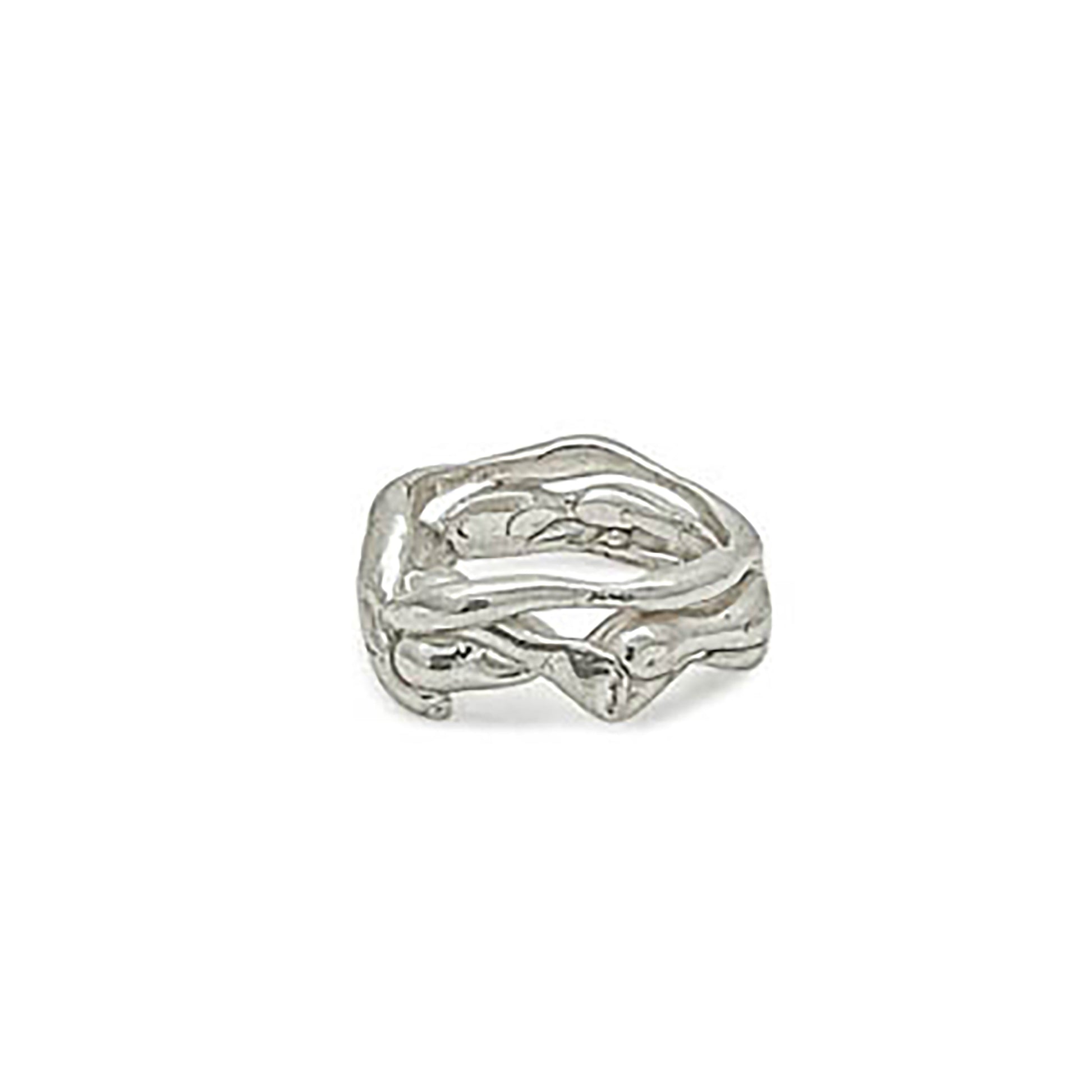 The Freedom Infinite Ring by FR | Art Jewellery is a sterling silver masterpiece designed to resemble intertwined branches, showcasing unique craftsmanship for a natural and organic look.