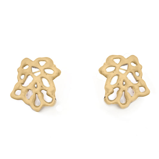 Introducing the Maple Earrings by FR | Art Jewellery: A pair of gold-tone, intricate, filigree-style earrings. The design features various abstract shapes and cutouts, resembling a delicate, lace-like pattern. Handmade jewellery with a polished, shiny finish that speaks of meticulous craftsmanship.