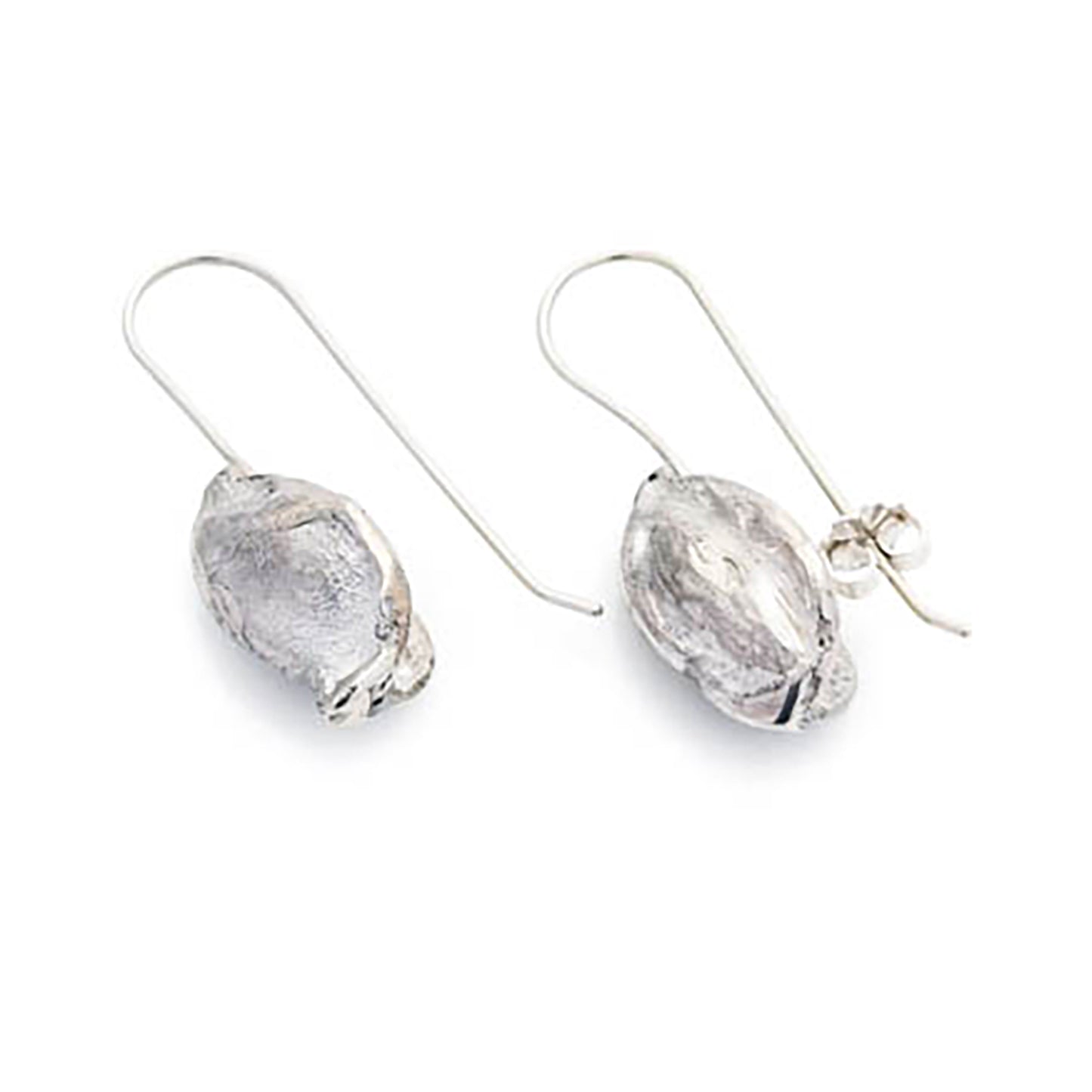 These Nut earrings from FR | Art Jewellery feature unique, organic shapes that resemble seeds or pods. As part of our handmade jewelry collection, each earring is attached to a simple wire hook for easy wearing. The shiny silver surface boasts a reflective finish with subtle textural details.