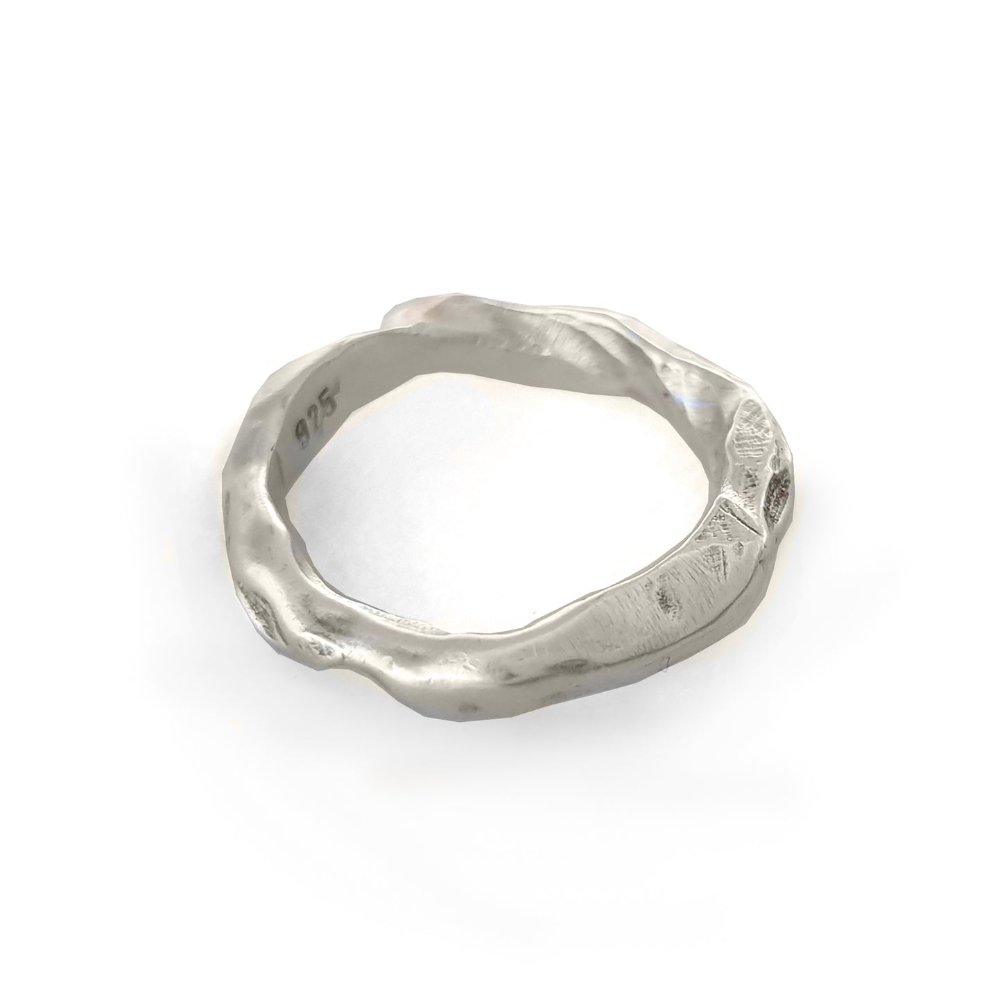 The Ocean Band by FR | Art Jewellery is a gold ring featuring a distinctive wavy texture that wraps around the band. With its polished finish and handcrafted appearance, the ring exudes an organic and artistic vibe. Subtle engravings adorn the inside of the band. This exquisite piece of handmade jewellery is showcased against a white background.
