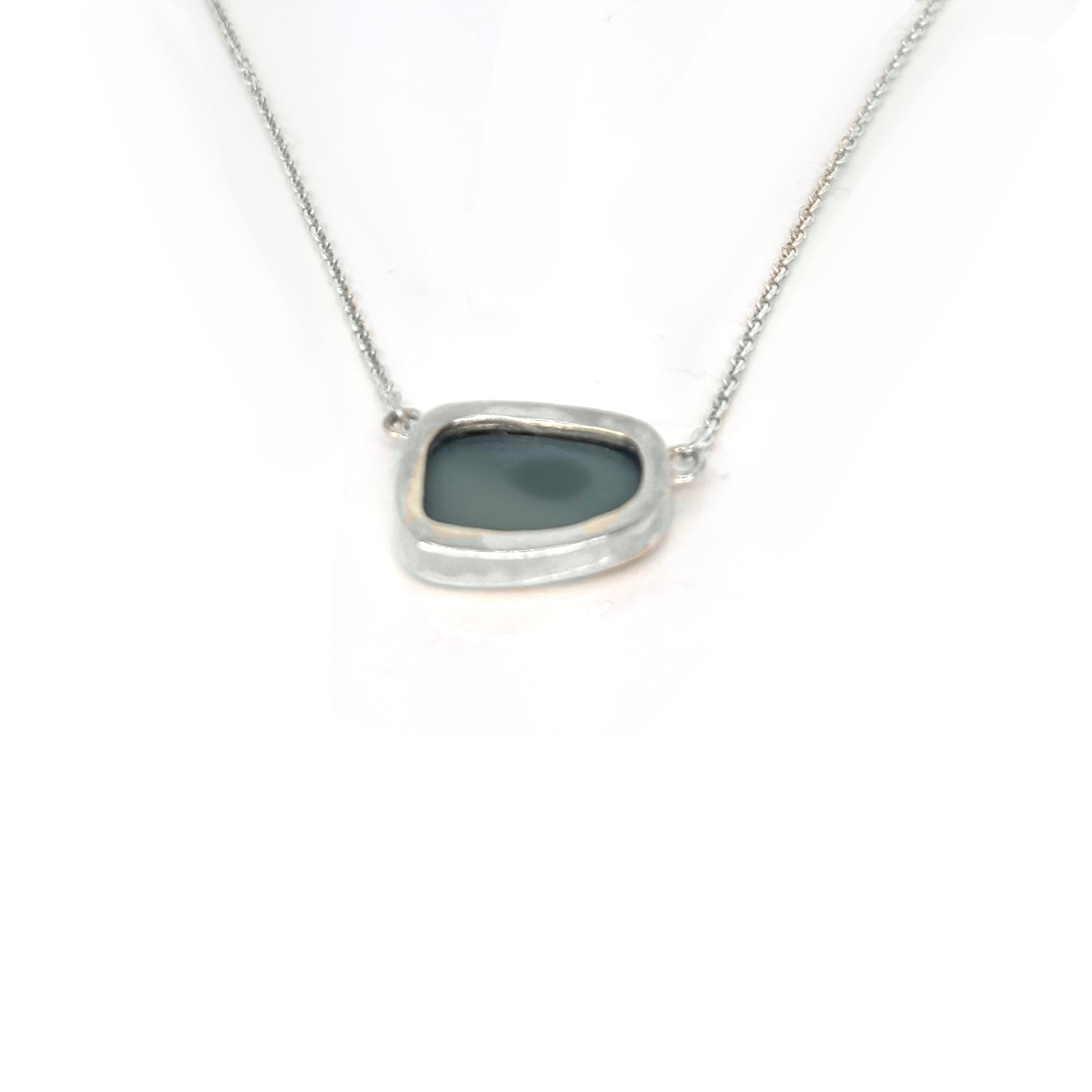 Handmade sterling silver necklace featuring a freeform Australian opal with vibrant blue and red tones, designed by FR Art Jewellery.