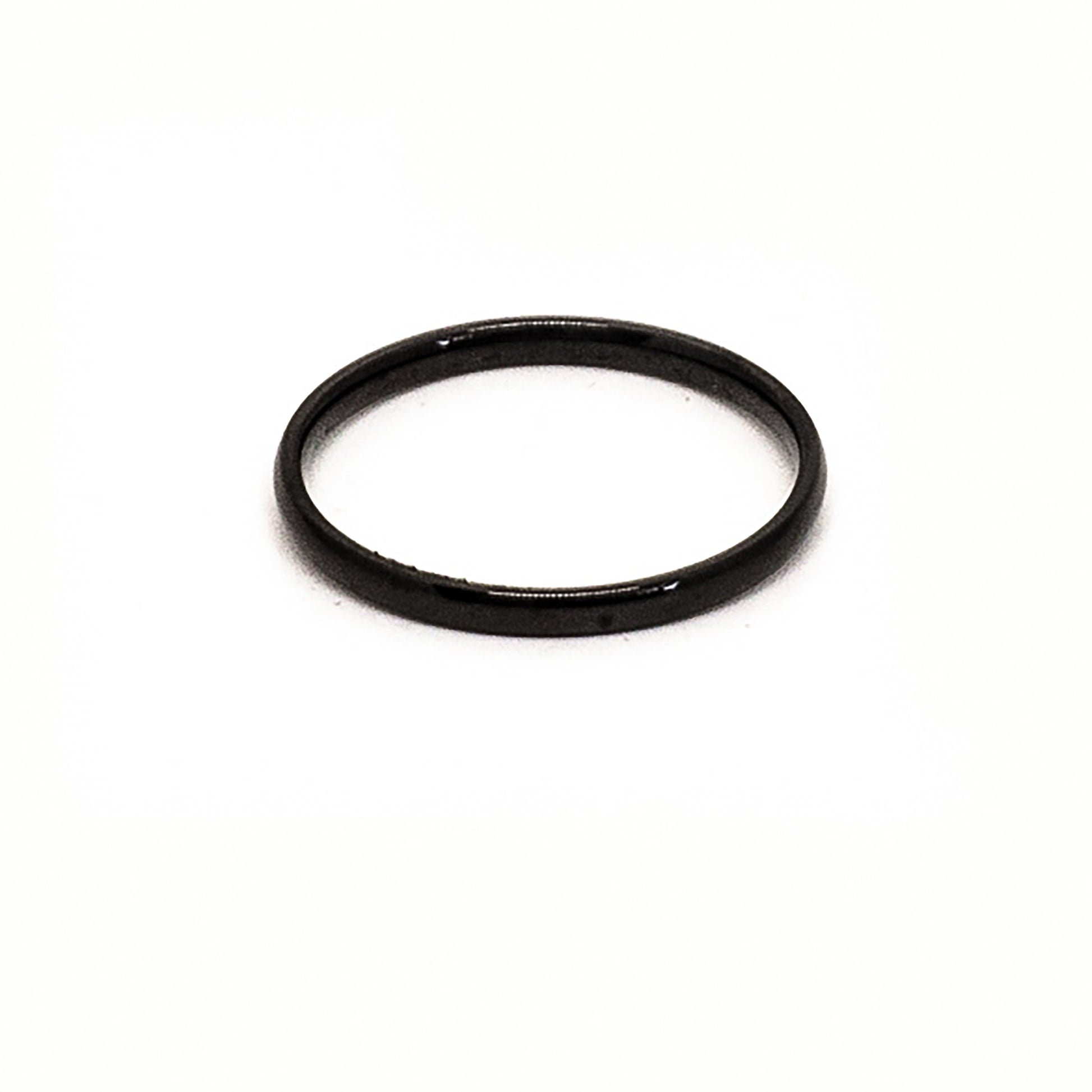 The Stainless Steel Black 2mm ring by FR | Art Jewellery is displayed upright against a plain white background, showcasing its simple and thin stacking design.