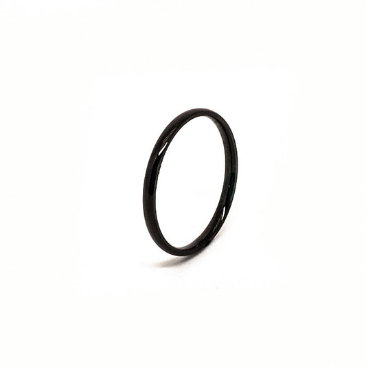 The Stainless Steel Black 2mm ring by FR | Art Jewellery is displayed upright against a plain white background, showcasing its simple and thin stacking design.