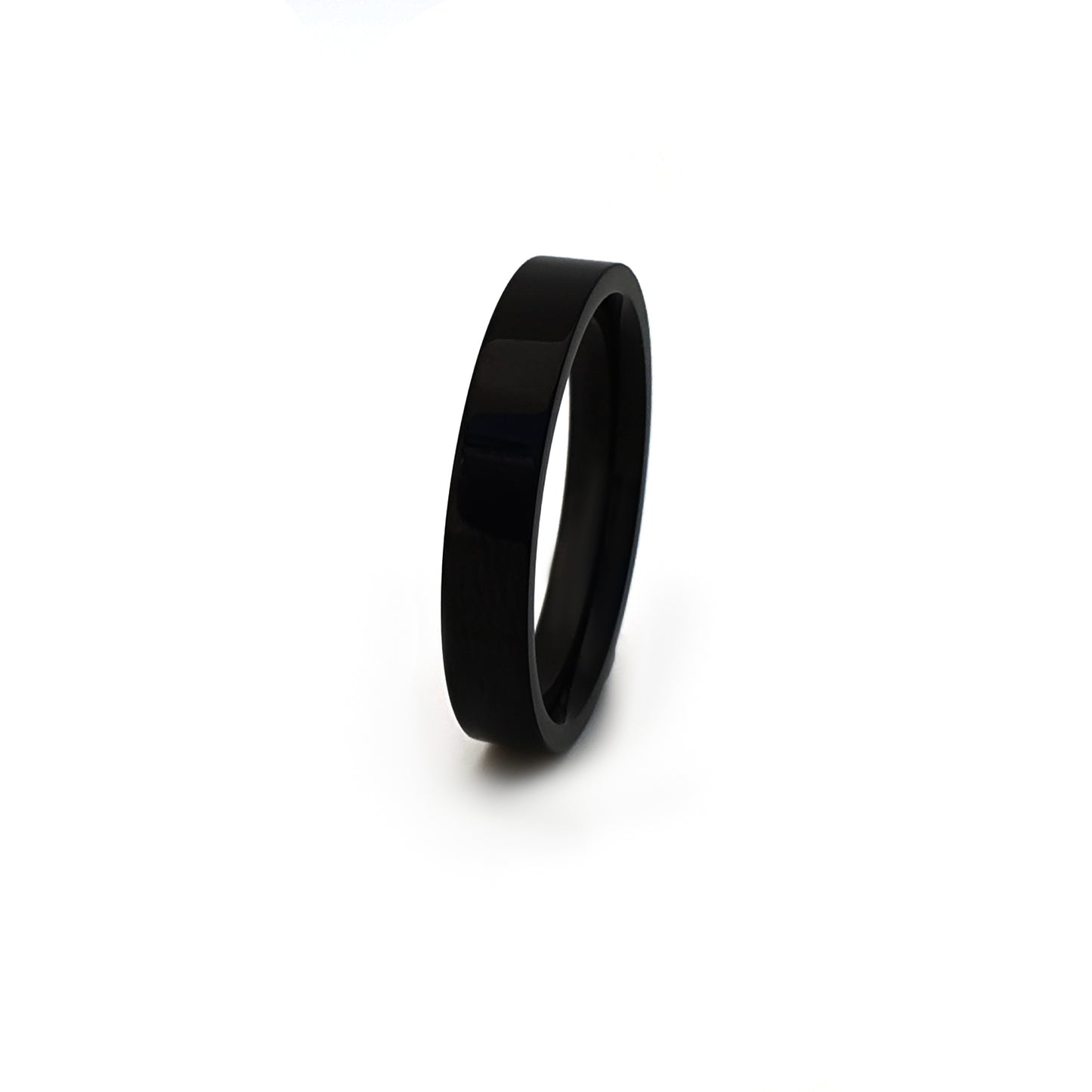 The FR | Art Jewellery Stainless Steel Black 4mm ring features a smooth, polished black finish and a comfortable fit, shown upright against a white background.