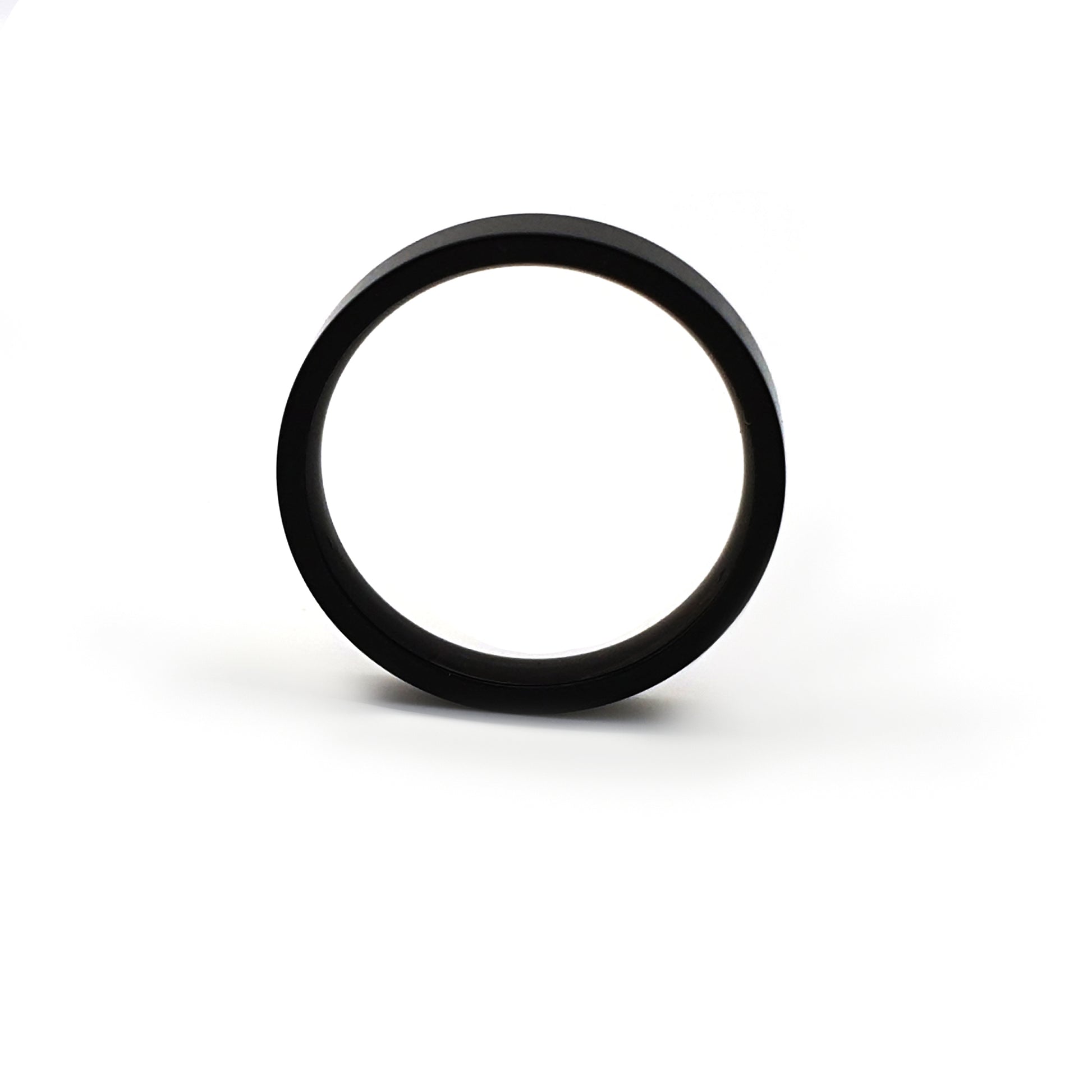 The FR | Art Jewellery Stainless Steel Black 4mm ring features a smooth, polished black finish and a comfortable fit, shown upright against a white background.