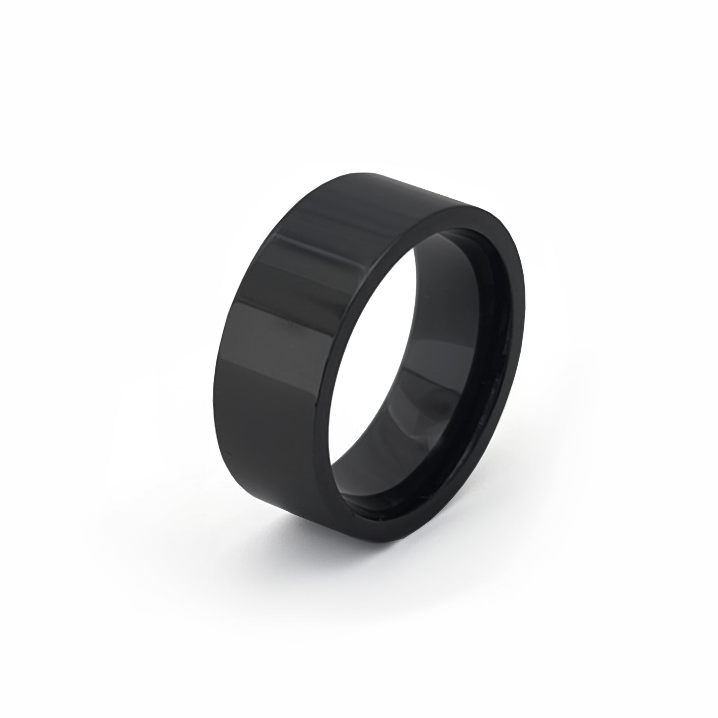 The FR | Art Jewellery Stainless Steel Black Flat Ring features a wide, solid black band with a smooth and glossy finish, displayed against a plain white background.