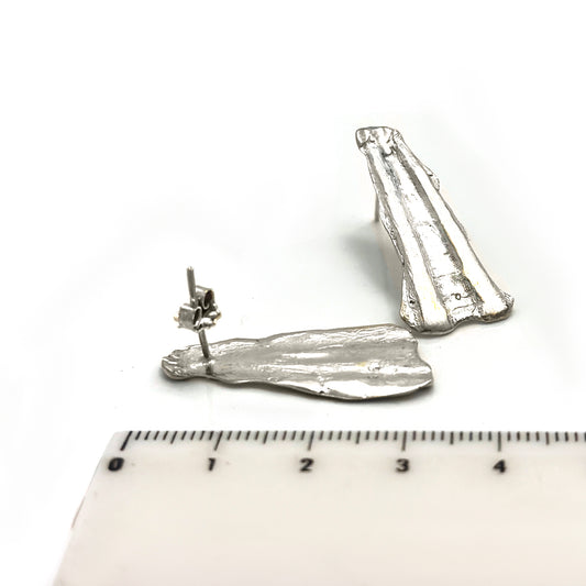 Sterling silver sculptural shell-textured earrings with elongated ridges, handmade by FR Art Jewellery two