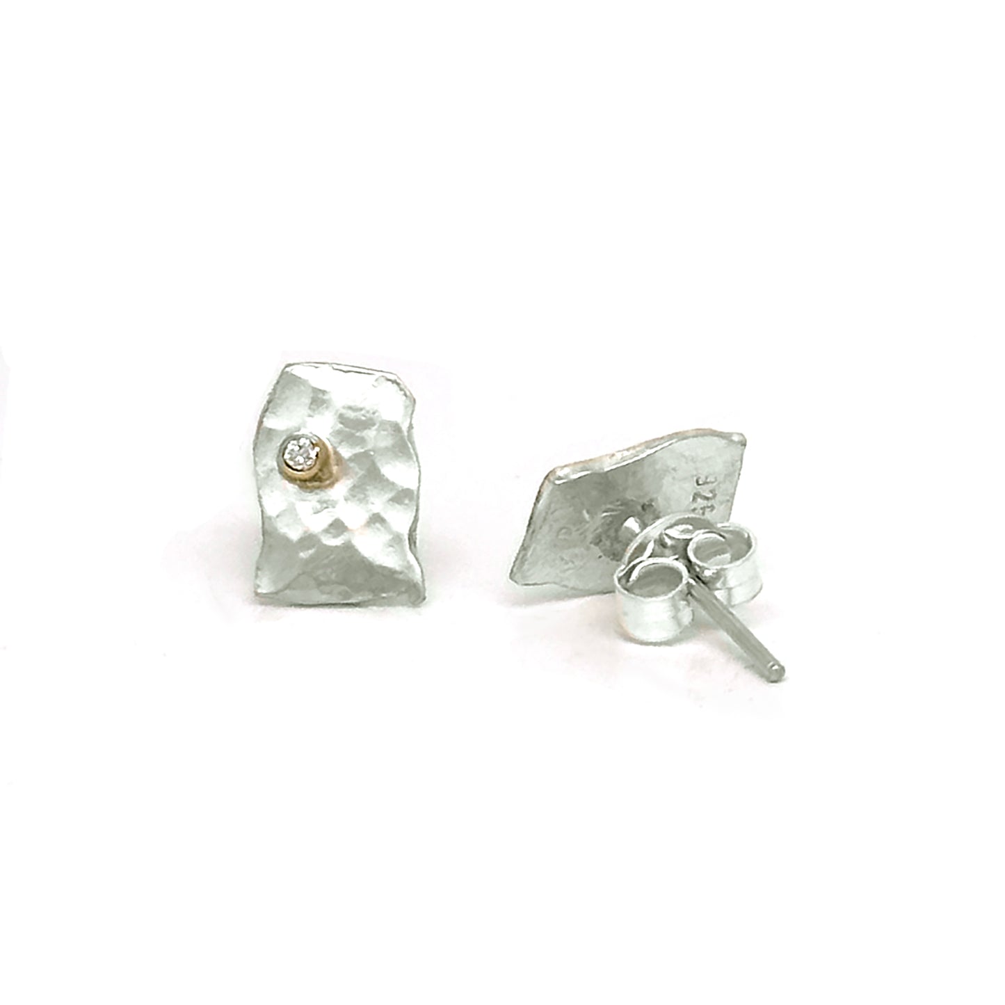 A pair of Small Shooting Star earrings by FR | Art Jewellery, featuring a gold-plated design with an uneven, hammered texture and a small, round diamond-like gem set in the center of each earring. The handmade jewelry is displayed against a plain white background.