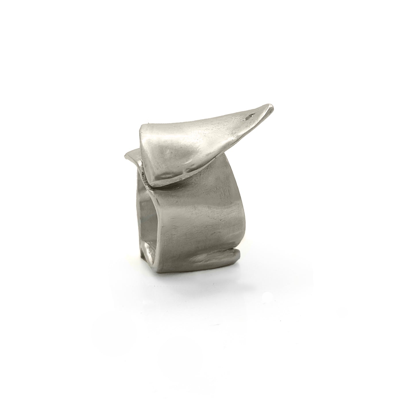 The Spiral Flow Ring by FR | Art Jewellery is a modern sterling silver ring featuring a smooth, sculptural form and a small inset diamond, shown on a white reflective surface.