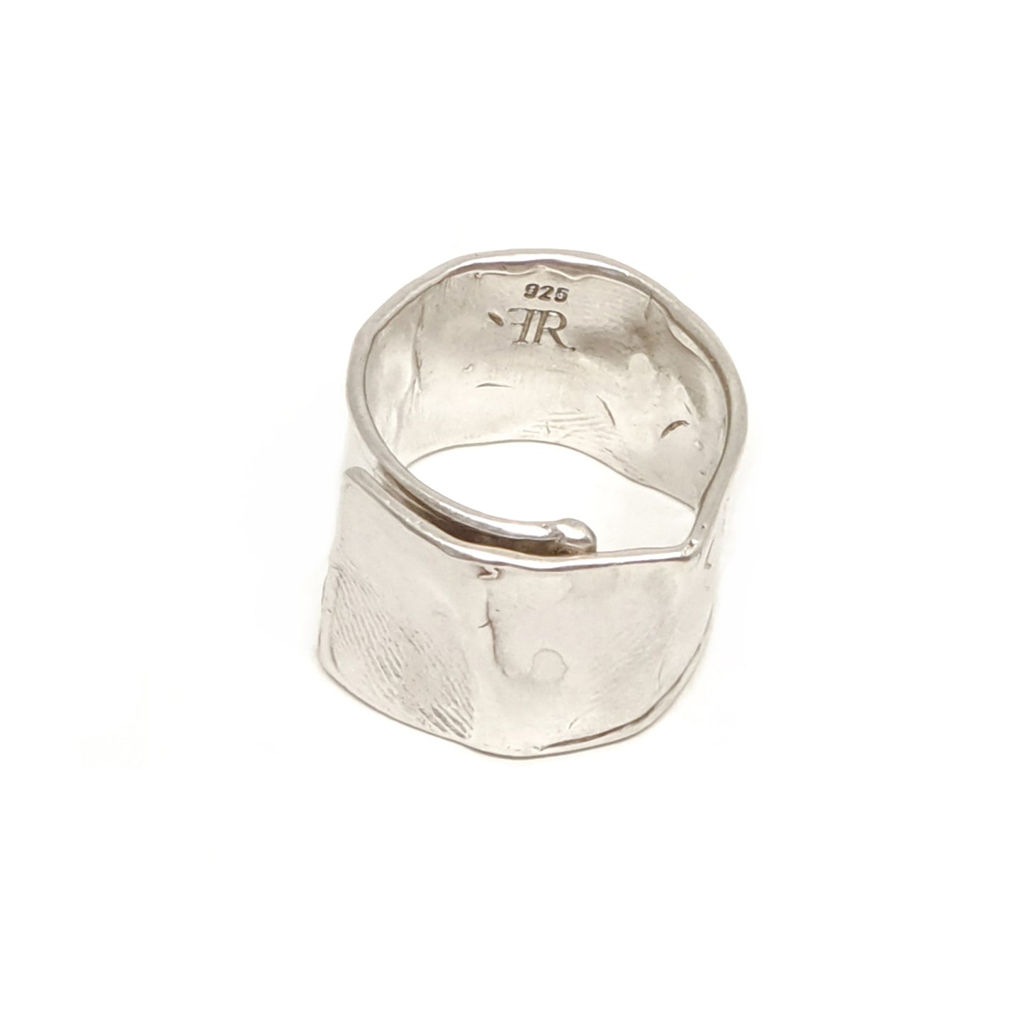 The Sterling Silver Spirel Ring by FR | Art Jewellery features a wide, oxidised band with a wavy textured surface and a visible fingerprint, giving this handcrafted piece an organic, one-of-a-kind look.