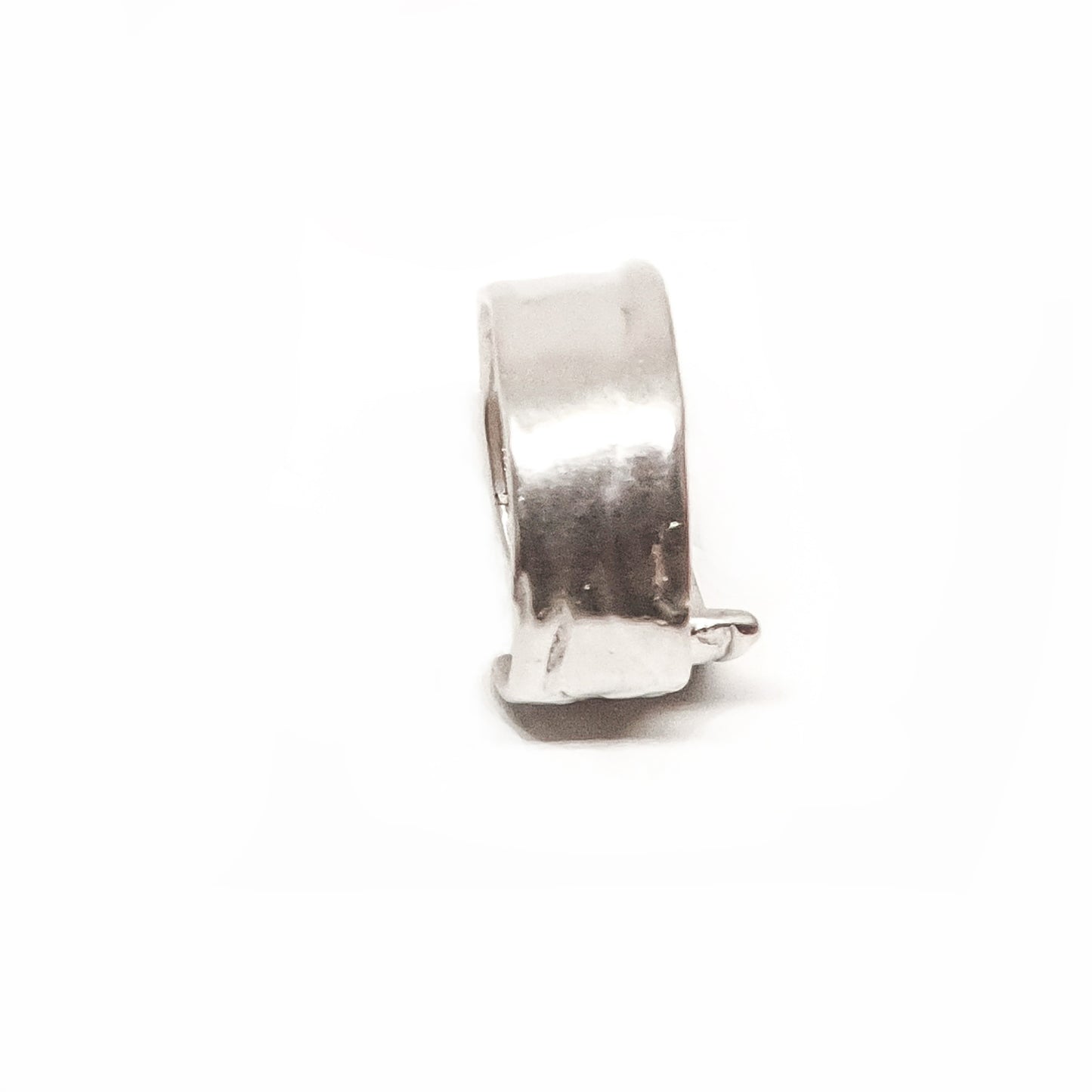 The Sterling Silver Spirel Ring by FR | Art Jewellery features a wide, oxidised band with a wavy textured surface and a visible fingerprint, giving this handcrafted piece an organic, one-of-a-kind look.
