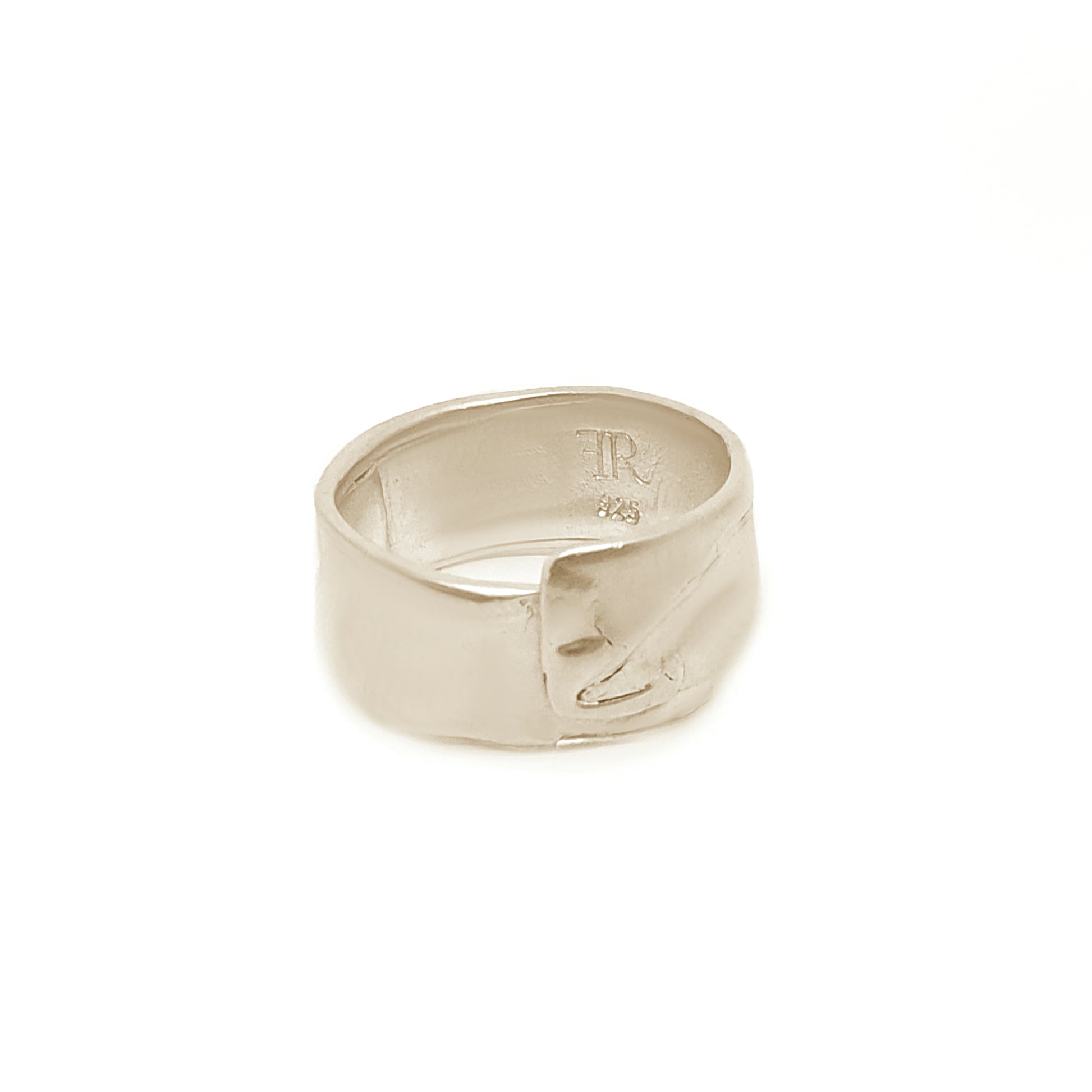 The Sterling Silver Spirel Ring by FR | Art Jewellery features a wide, oxidised band with a wavy textured surface and a visible fingerprint, giving this handcrafted piece an organic, one-of-a-kind look.