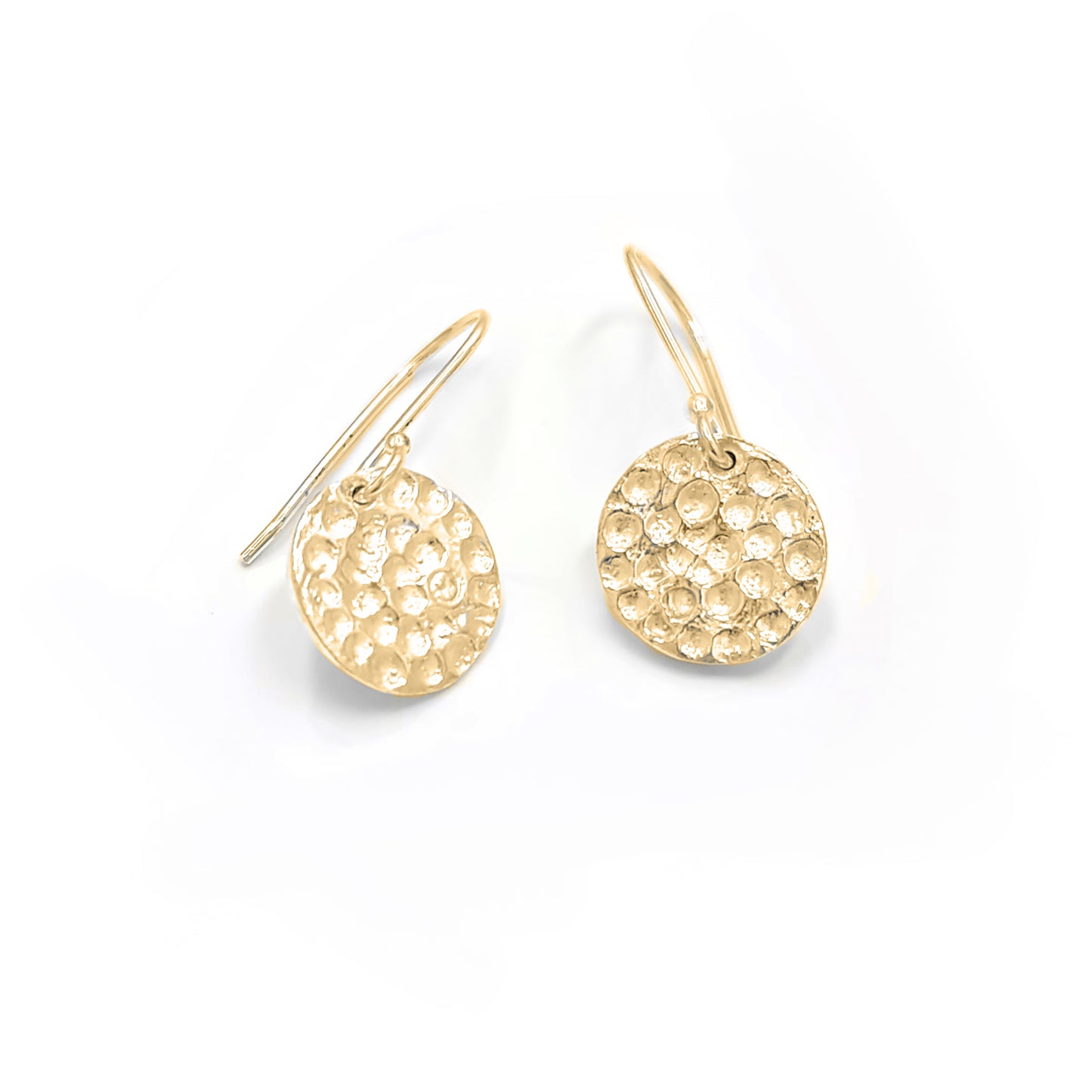 The Spot Earrings by FR | Art Jewellery are a pair of delicate sterling silver drop earrings, featuring textured circular discs hanging from simple hooks. The discs boast a hammered finish that adds a touch of sparkle, perfectly showcasing the elegance of handmade jewelry. These exquisite earrings are displayed against a plain white background.