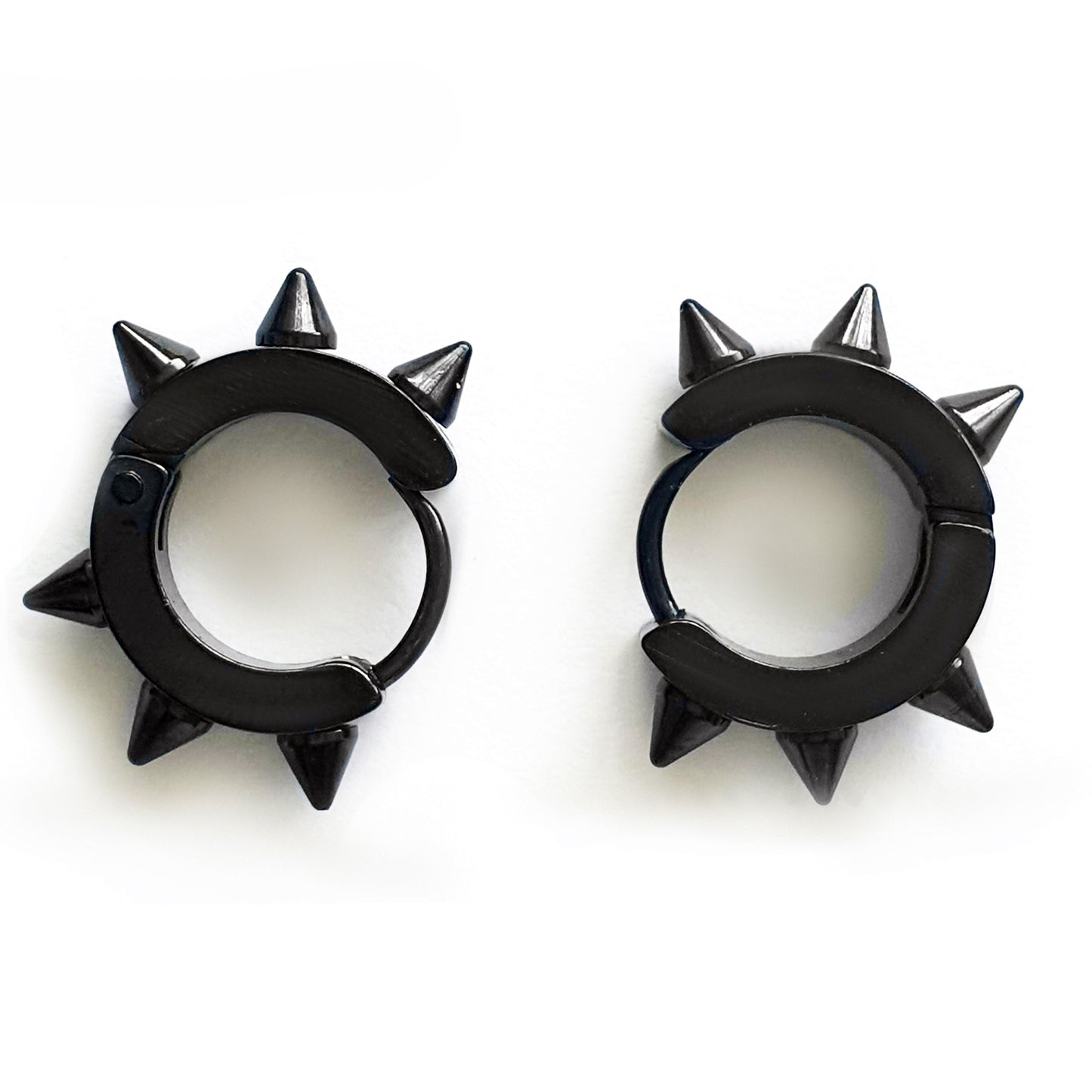 The Punk Stainless Steel earrings by FR | Art Jewellery are black hoops, each adorned with three evenly spaced pointed spikes for a bold, punk-inspired style.
