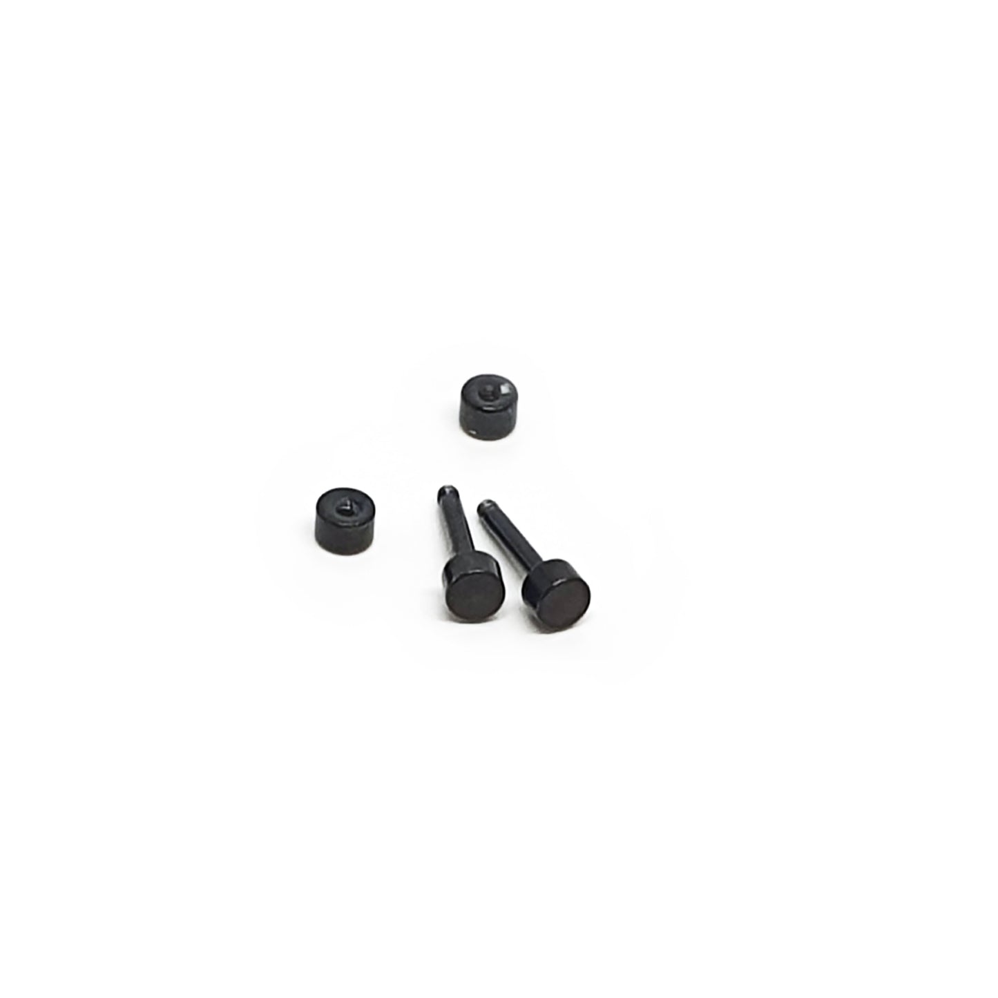 Four Double Stainless Steel Earrings by FR | Art Jewellery, in black unisex style, are arranged on a plain white background—two upright and two lying flat.