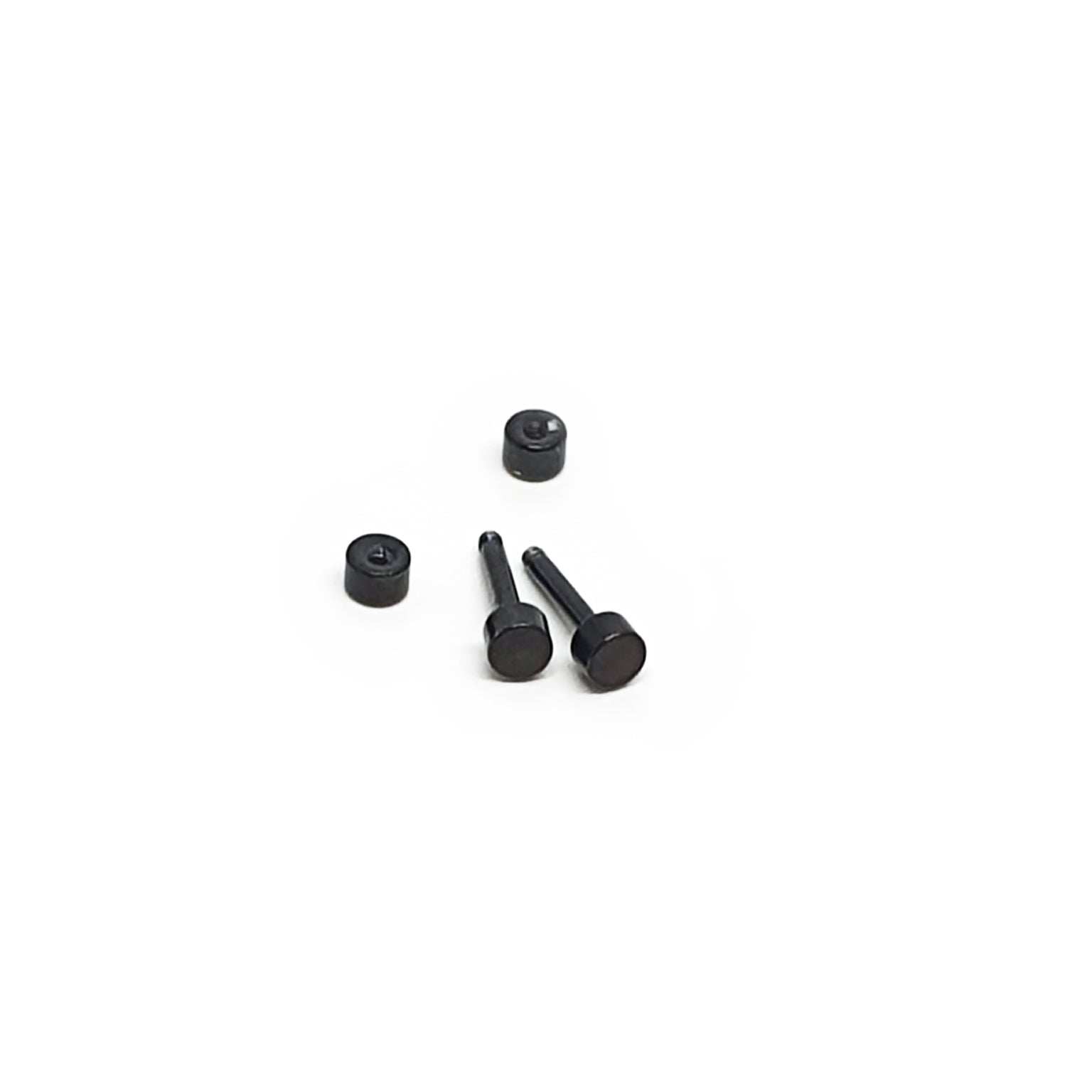 Four Double Stainless Steel Earrings by FR | Art Jewellery, in black unisex style, are arranged on a plain white background—two upright and two lying flat.