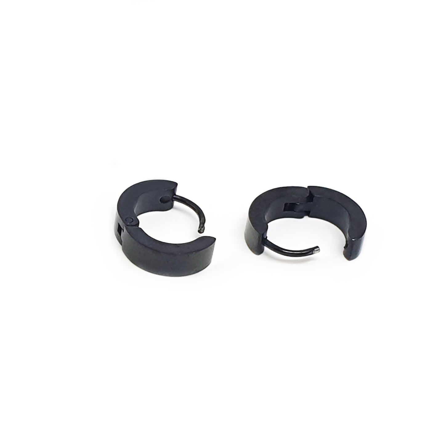 FR | Art Jewellery Hoop Stainless Steel earrings—two small black hoops, one open and one closed—are shown on a white background. Minimalist, hypoallergenic, and tarnish-resistant, they’re ideal for daily wear.