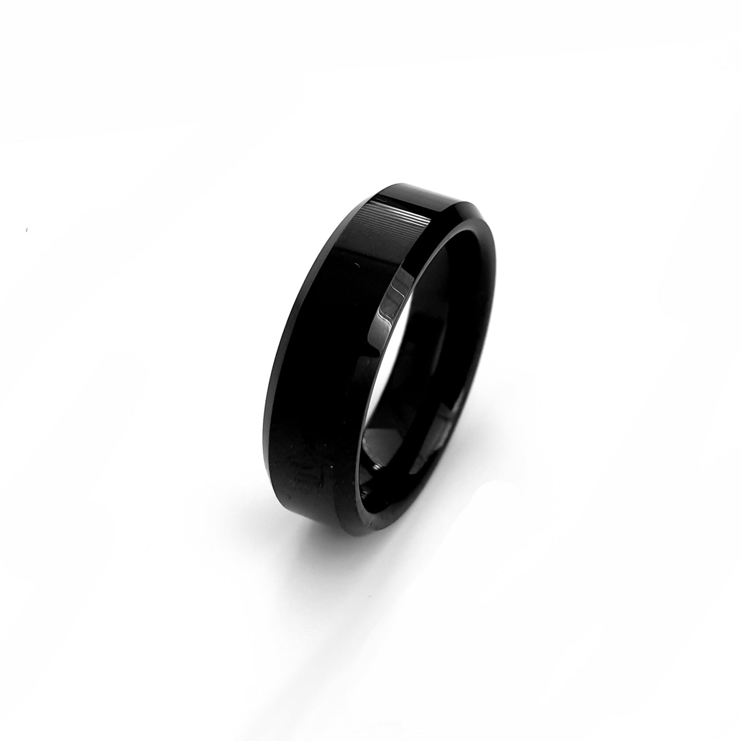 The FR | Art Jewellery Tungsten Black Bezel ring features a smooth, shiny finish and a comfort-fit design, showcased against a white background.