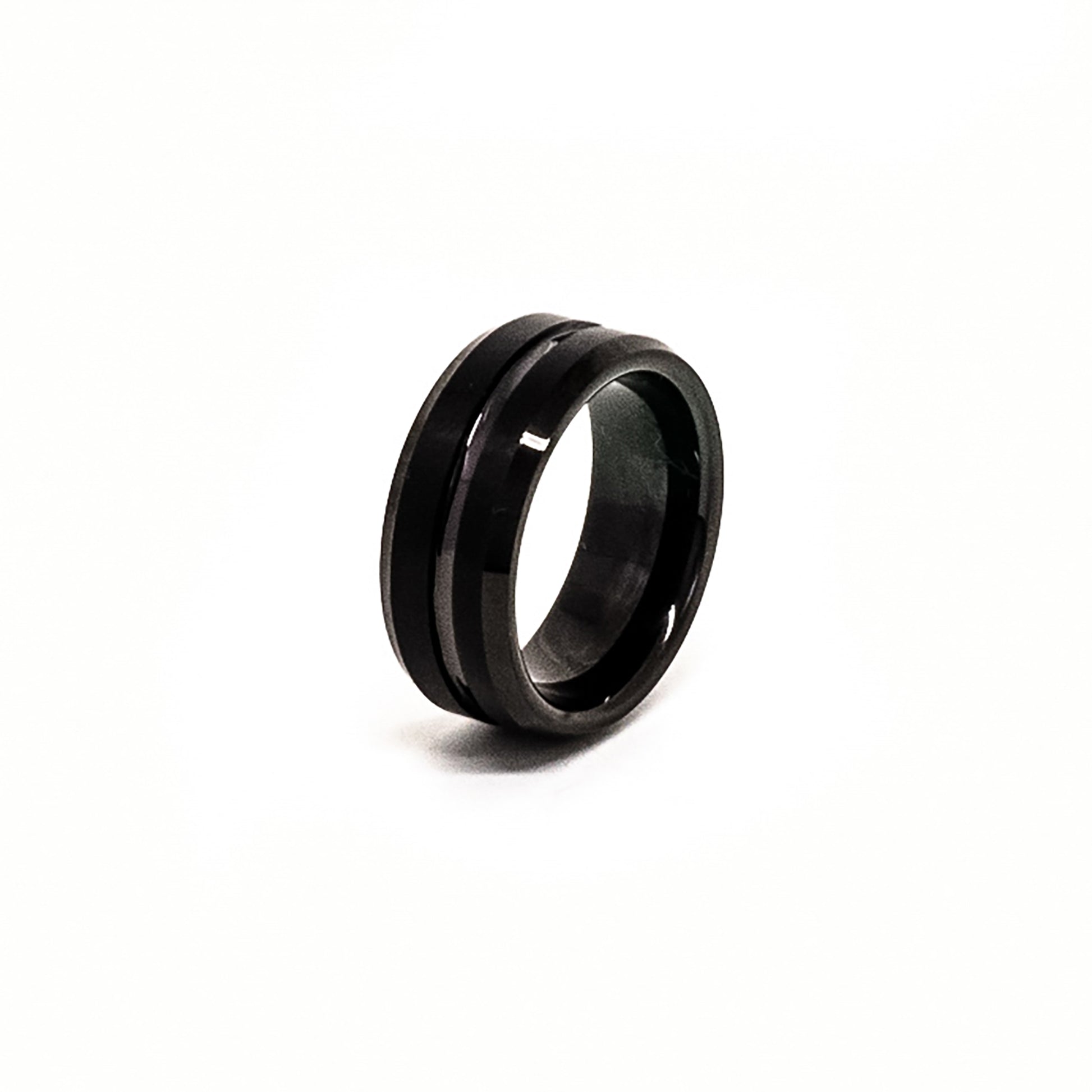 The FR | Art Jewellery Tungsten Black Middle Groove ring features a comfort fit, black matte finish, and a single glossy center groove, shown against a white background.