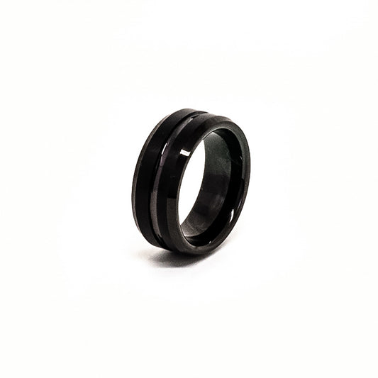 The FR | Art Jewellery Tungsten Black Middle Groove ring features a comfort fit, black matte finish, and a single glossy center groove, shown against a white background.