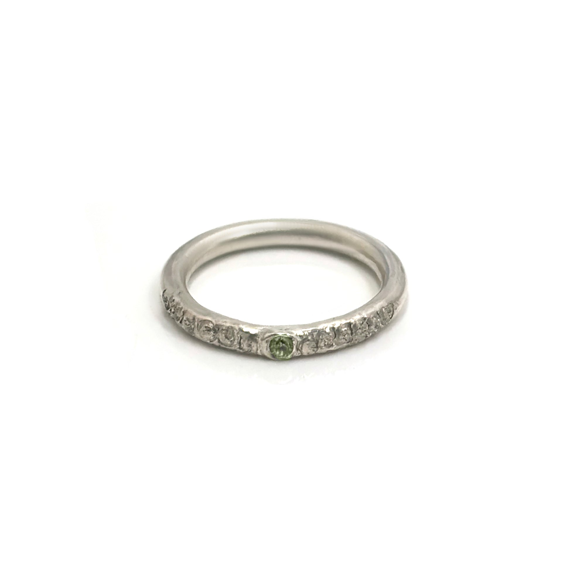 Sterling silver Tinytoo ring with red ruby gemstone, handmade stacking ring with textured finish.