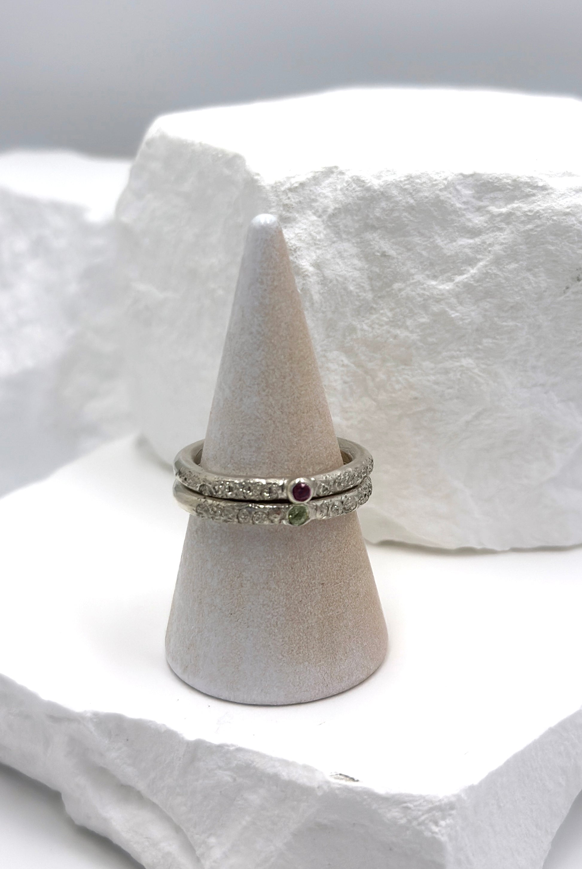Sterling silver Tinytoo ring with red ruby gemstone, handmade stacking ring with textured finish.